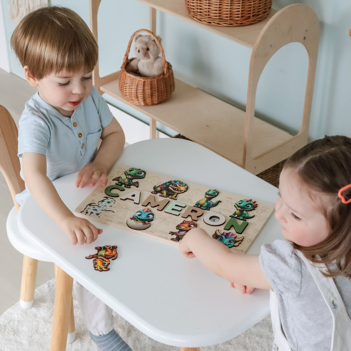 Personalized name puzzle with dinosaur theme