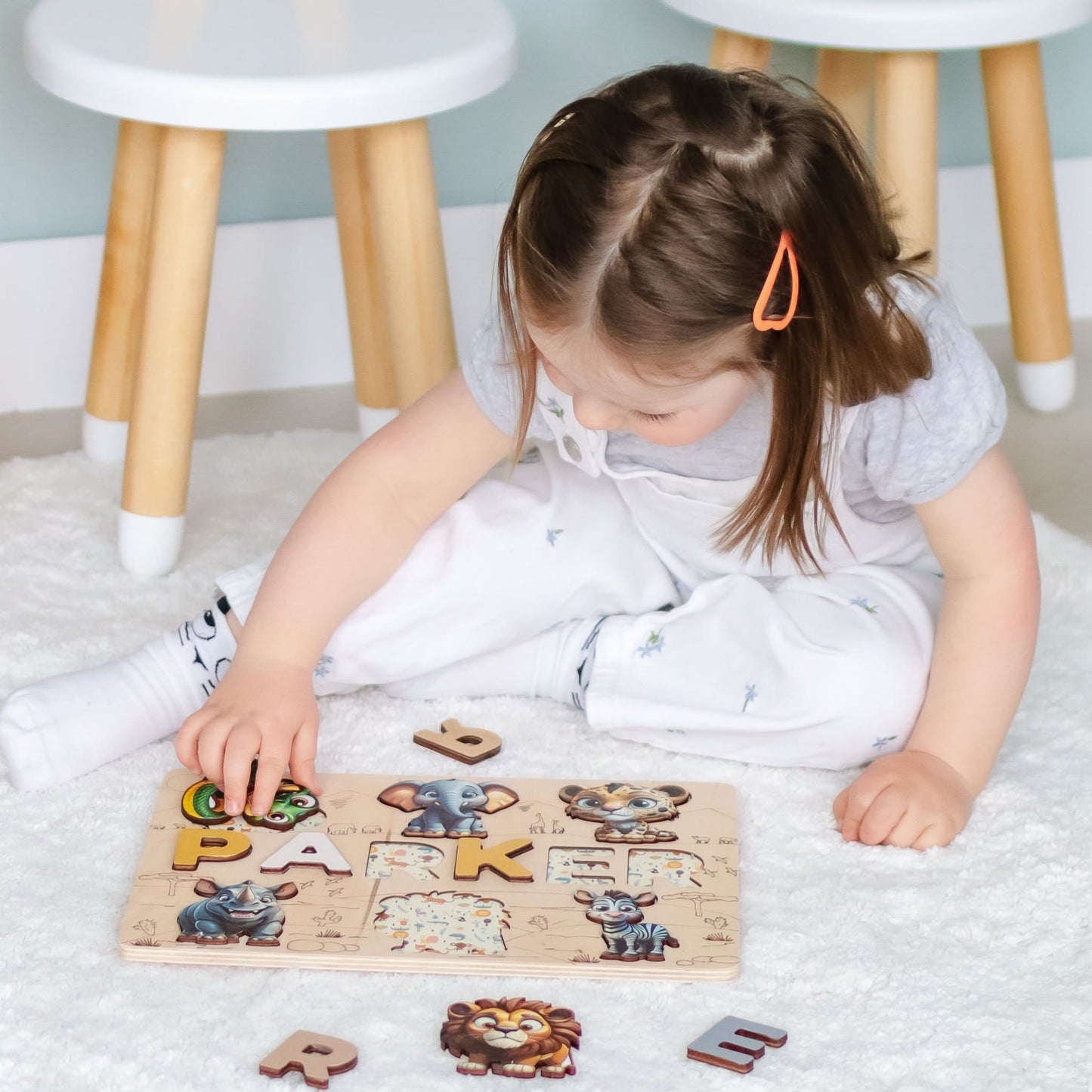 Educational puzzle with child’s name and jungle animals