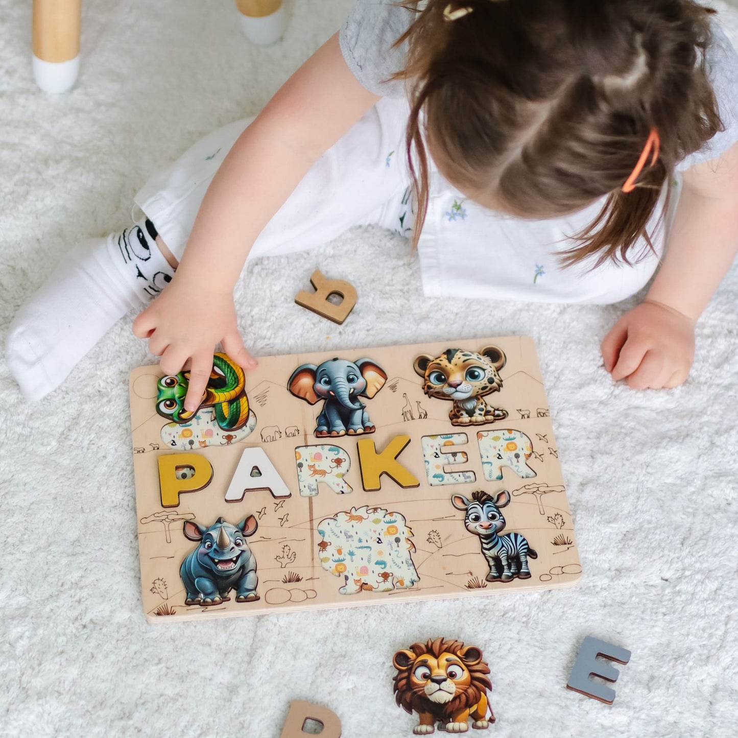 Wooden name puzzle gift with safari theme