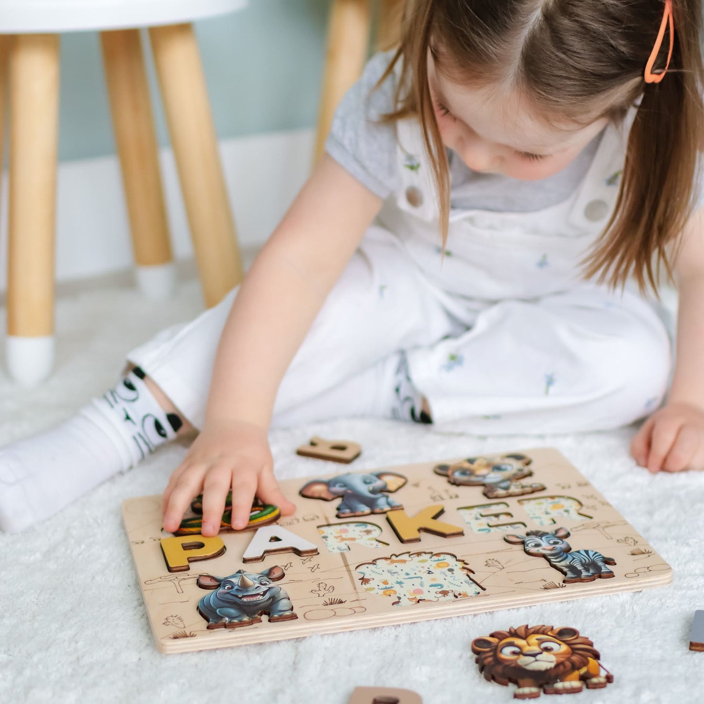 Toddler alphabet puzzle with wild animal magnets