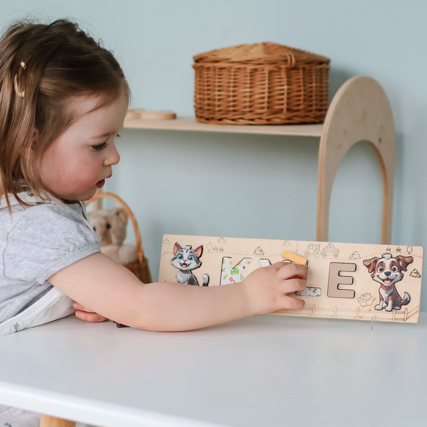 Toddler name puzzle with wooden horse and rooster