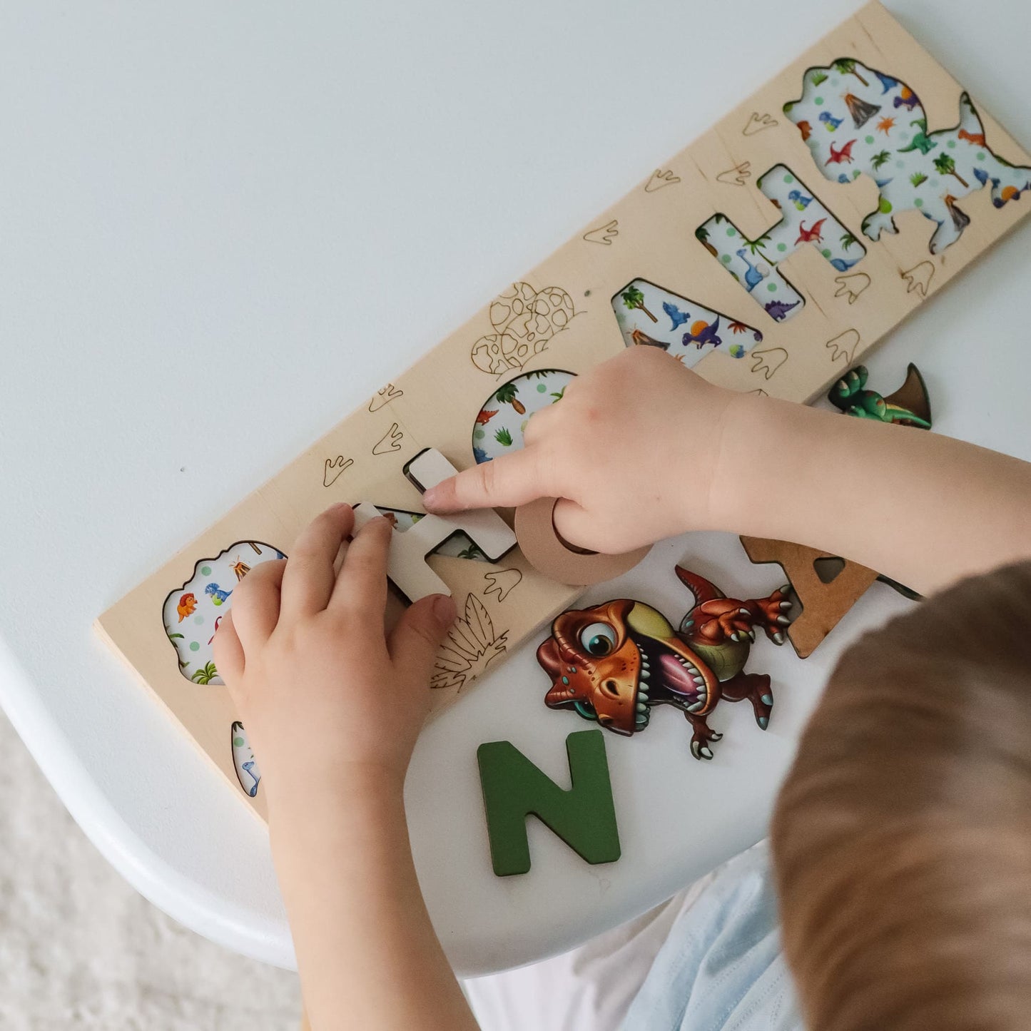 Dinosaur-themed learning toy for toddlers