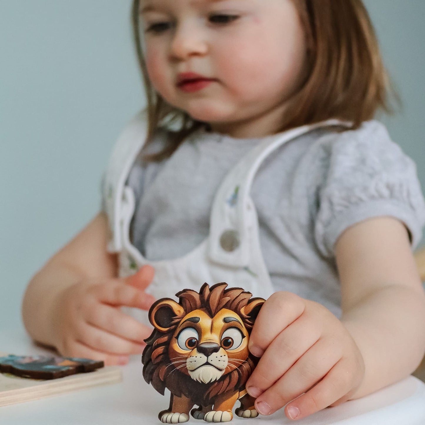 Custom wooden name puzzle with magnetic safari animals