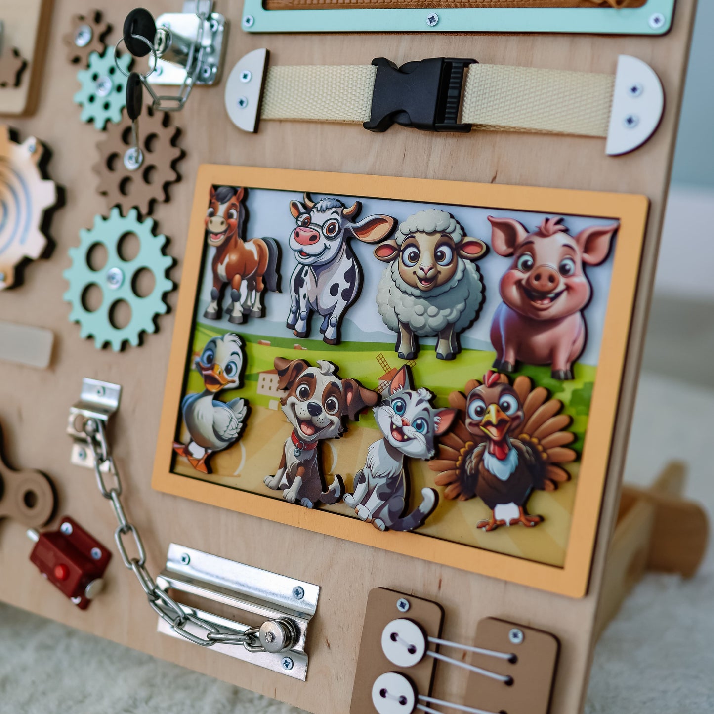 Montessori sensory board featuring a vibrant countryside scene