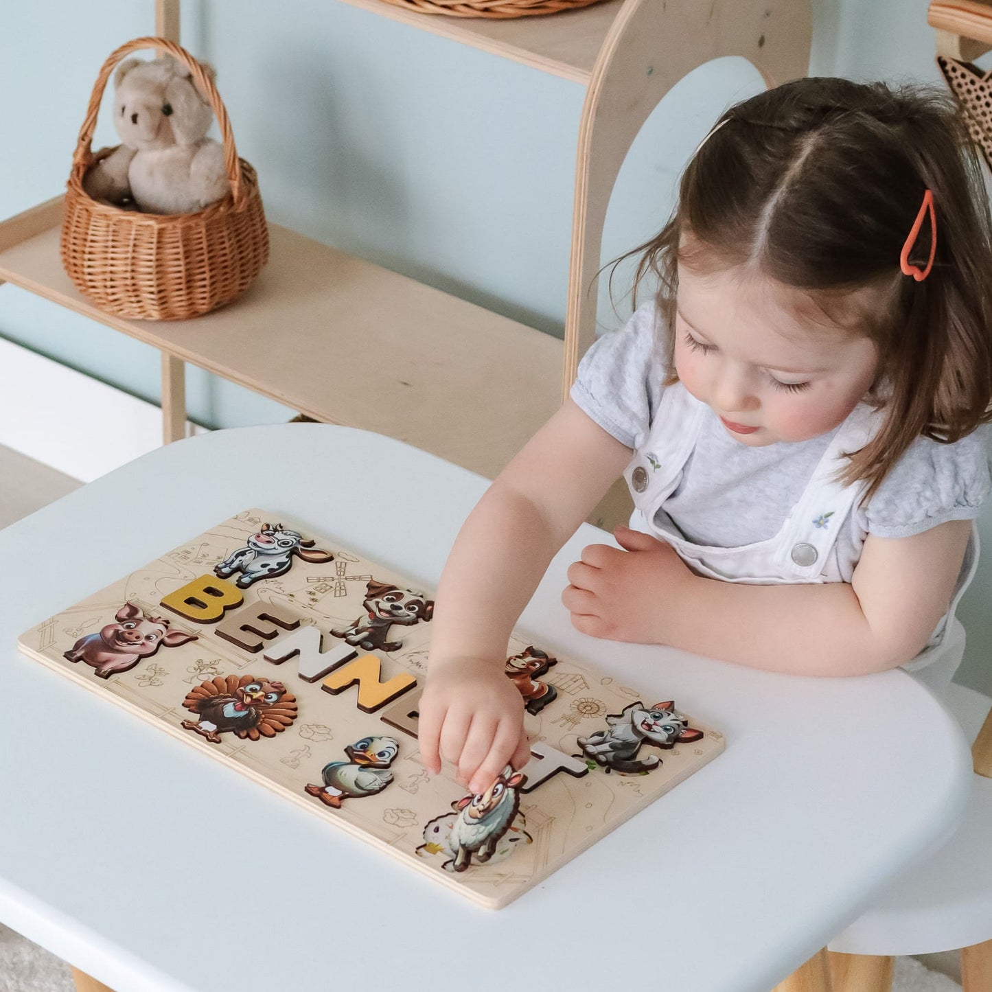 Montessori name puzzle with educational farm animals