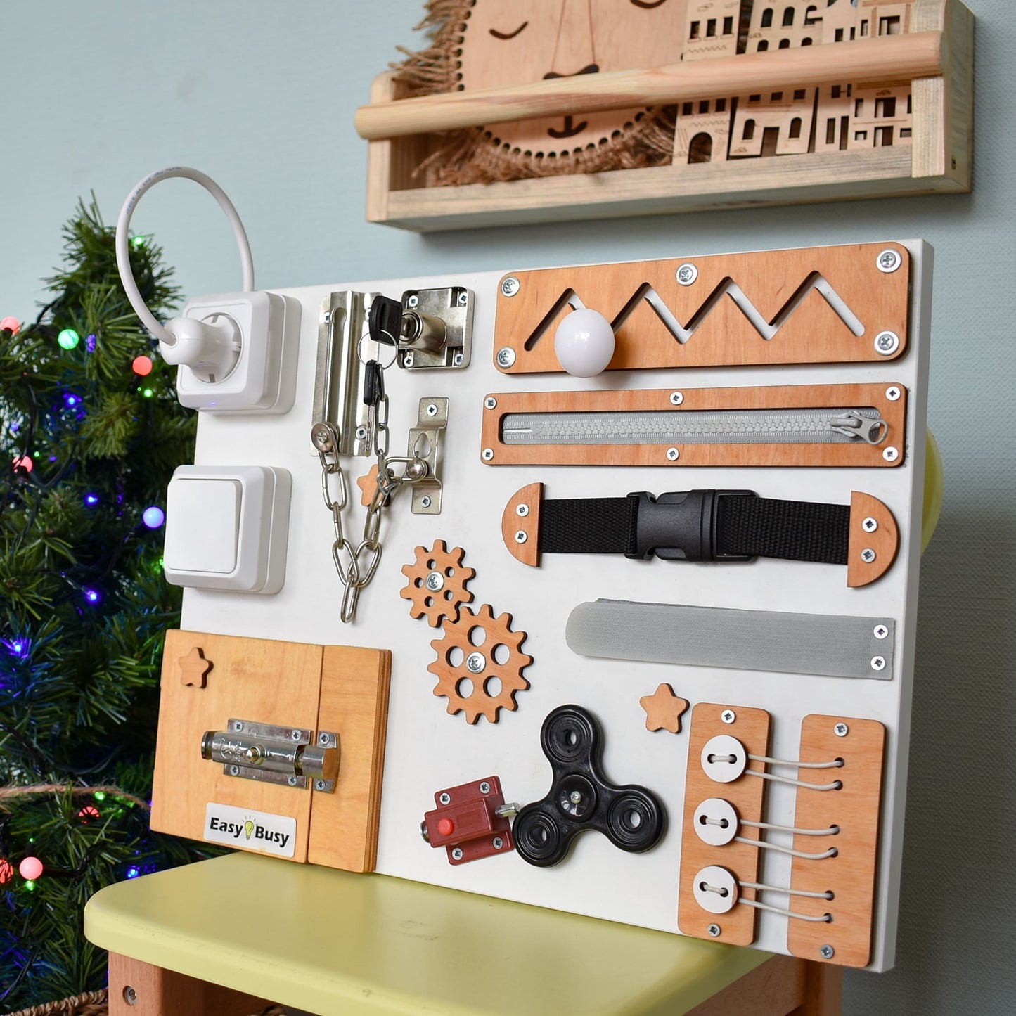 Educational toddler toy featuring real locks, gears, and switches