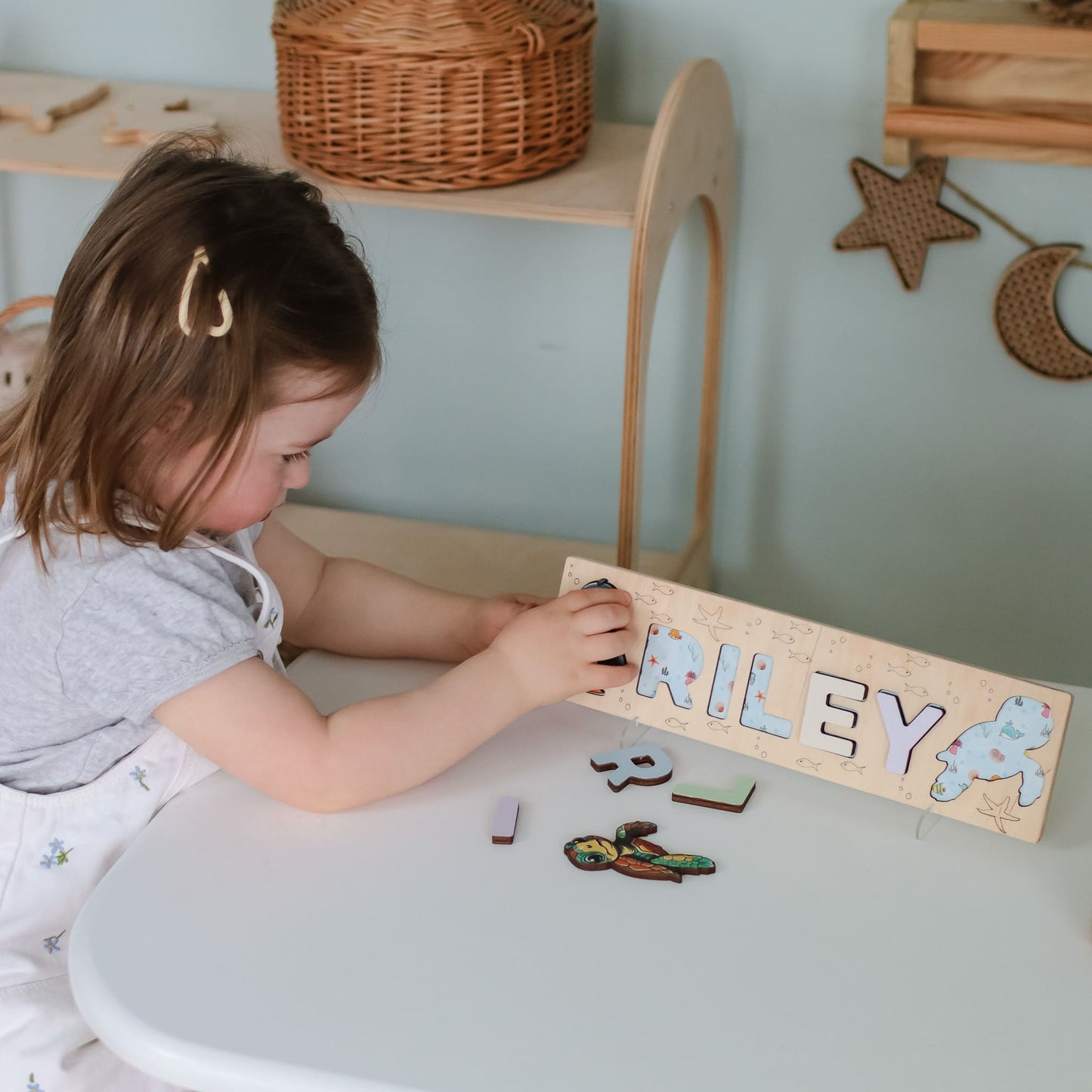 Name puzzle for children with aquatic theme