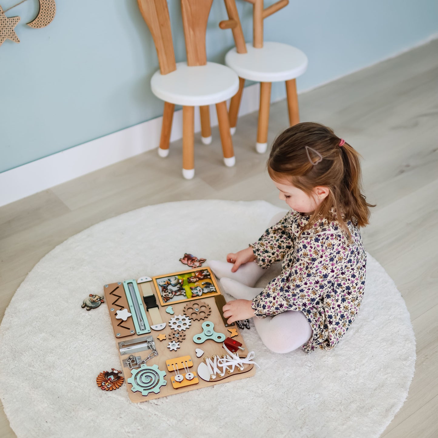 Handmade farm-themed busy board with removable magnetic animals
