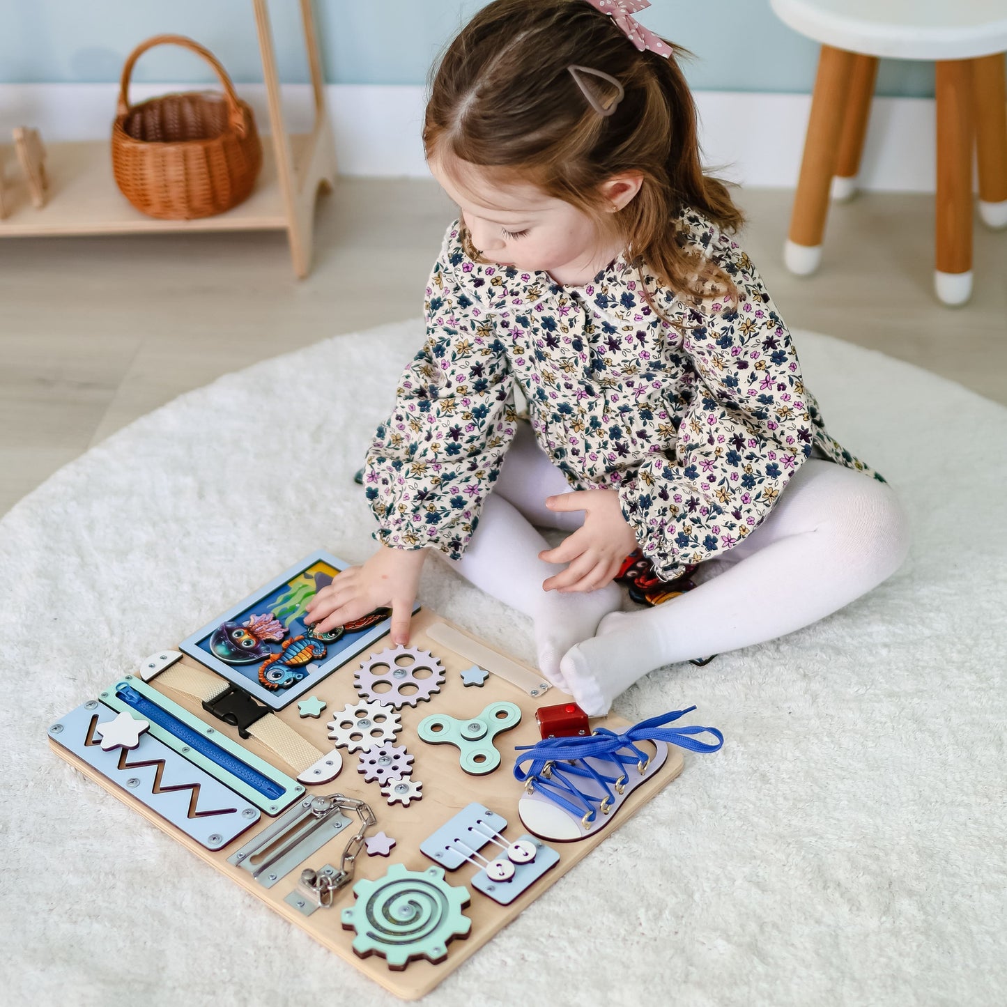 Handmade ocean-themed Montessori activity board with removable magnetic animals