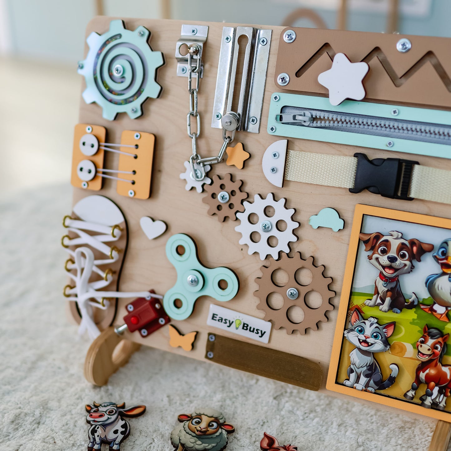 Fine motor skill development toy with a colorful farm background