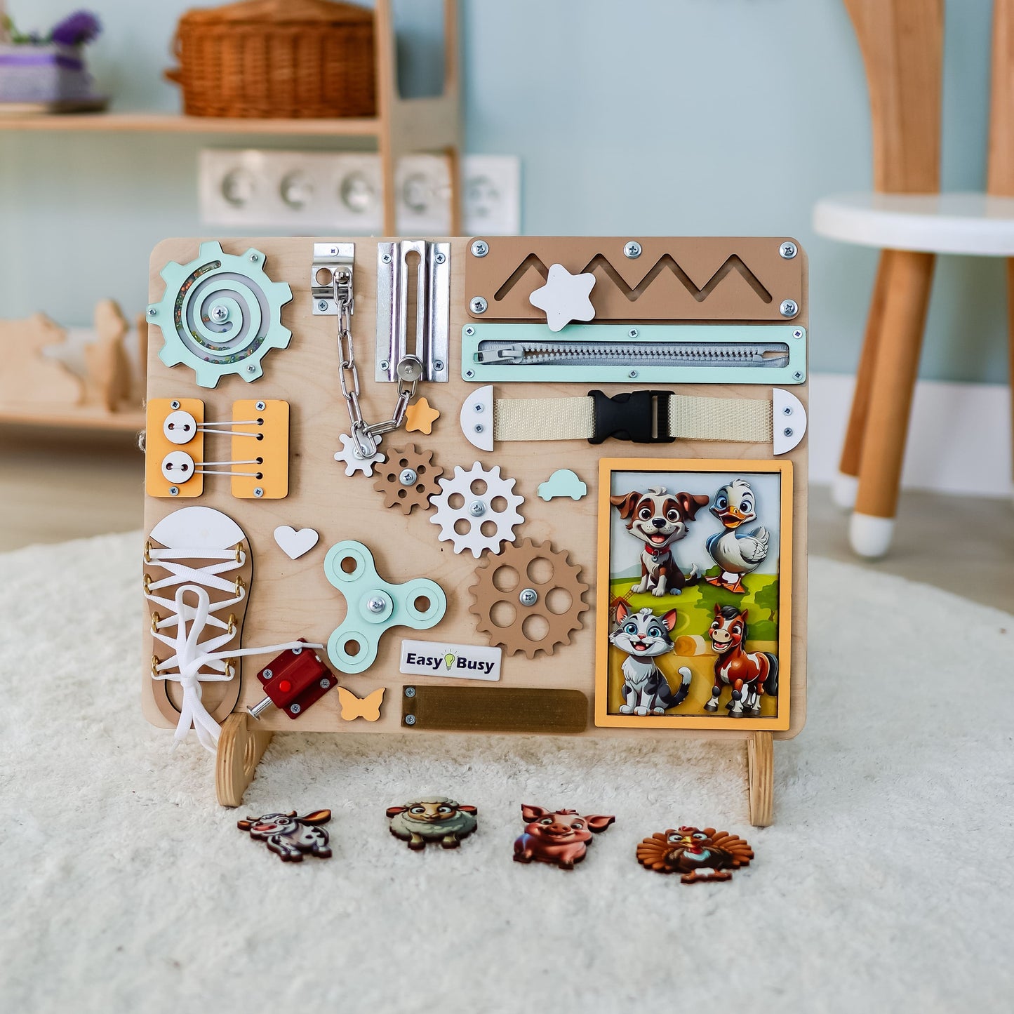 Toddler arranging magnetic farm animals on an interactive activity board