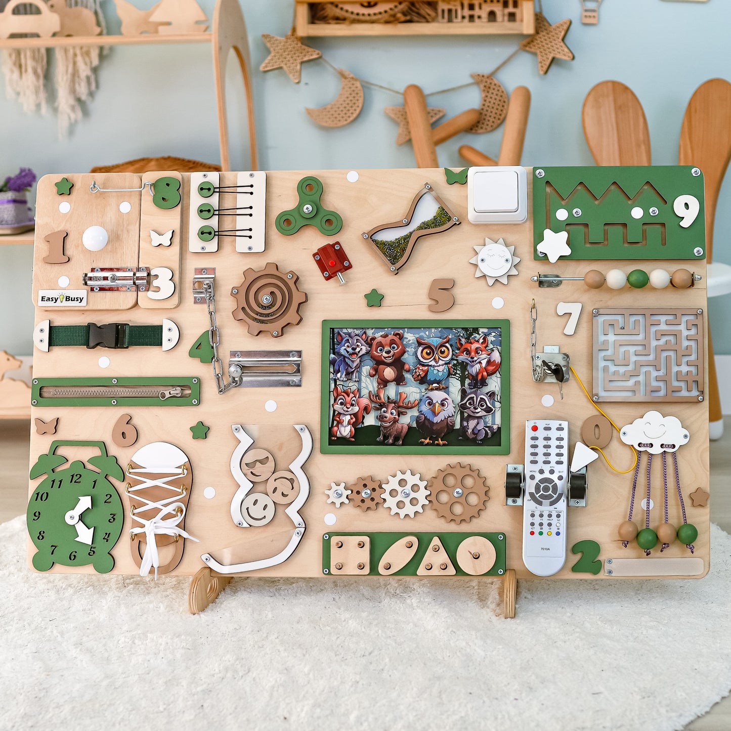 Fine motor skill toy with removable magnetic forest creatures