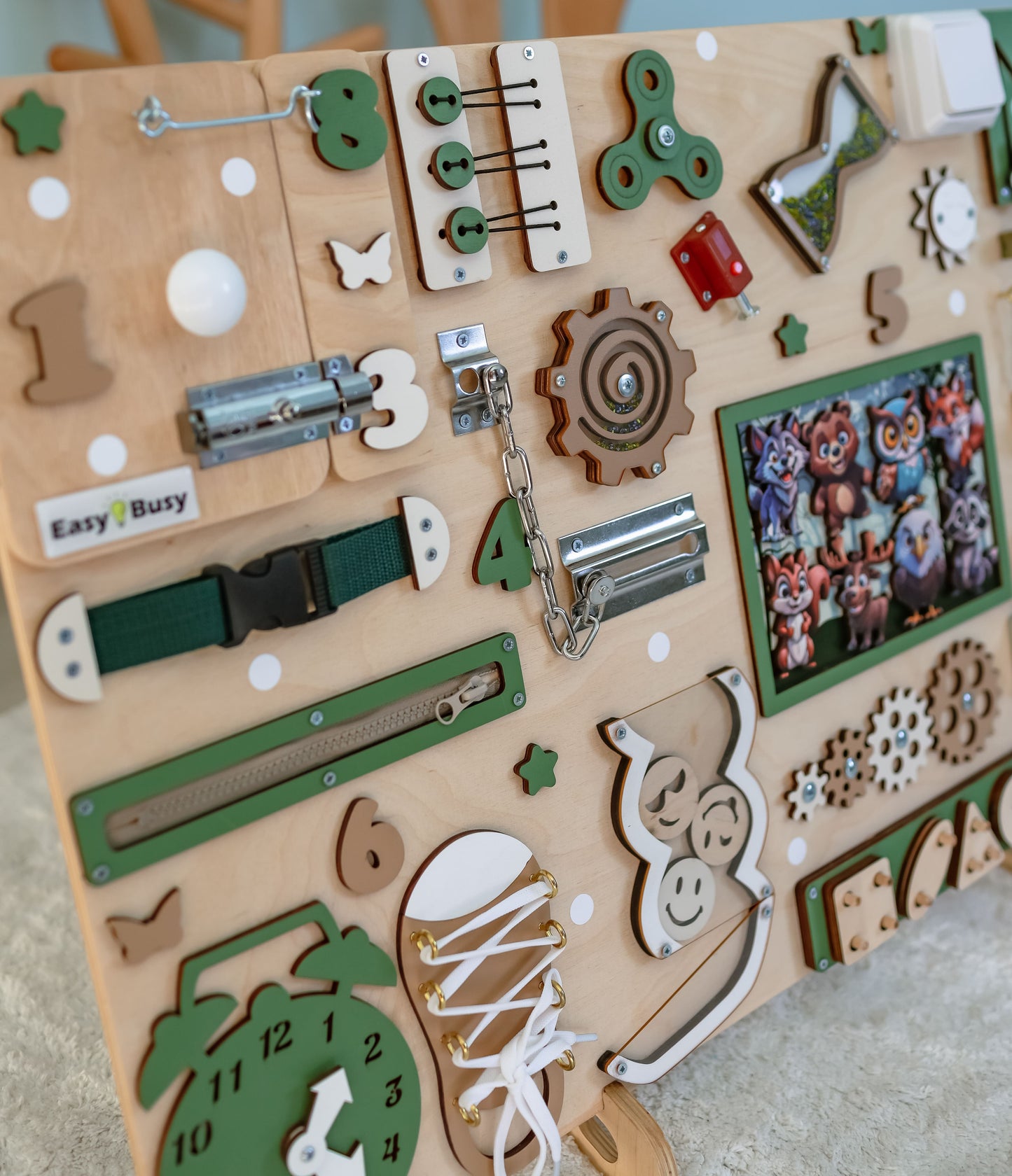 Montessori sensory play board with fox, bear, and owl magnets