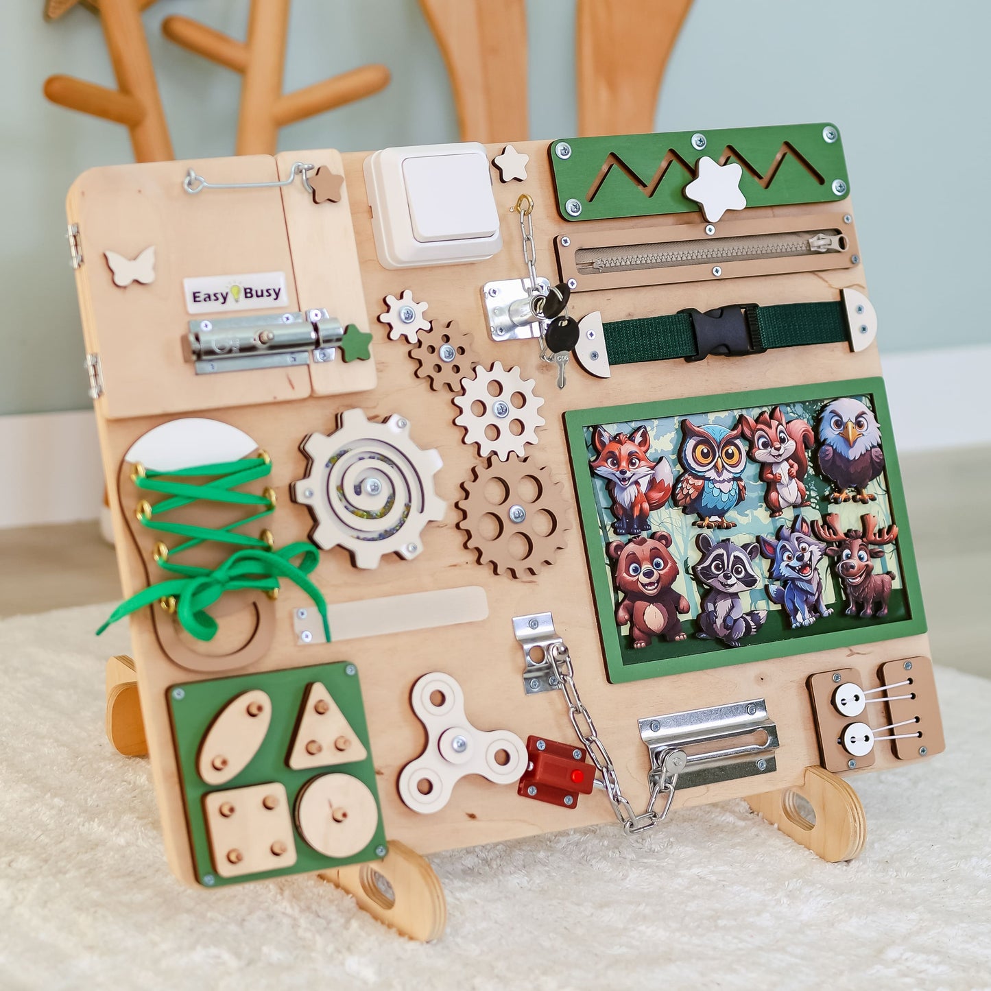 Montessori activity board with a nature-inspired background