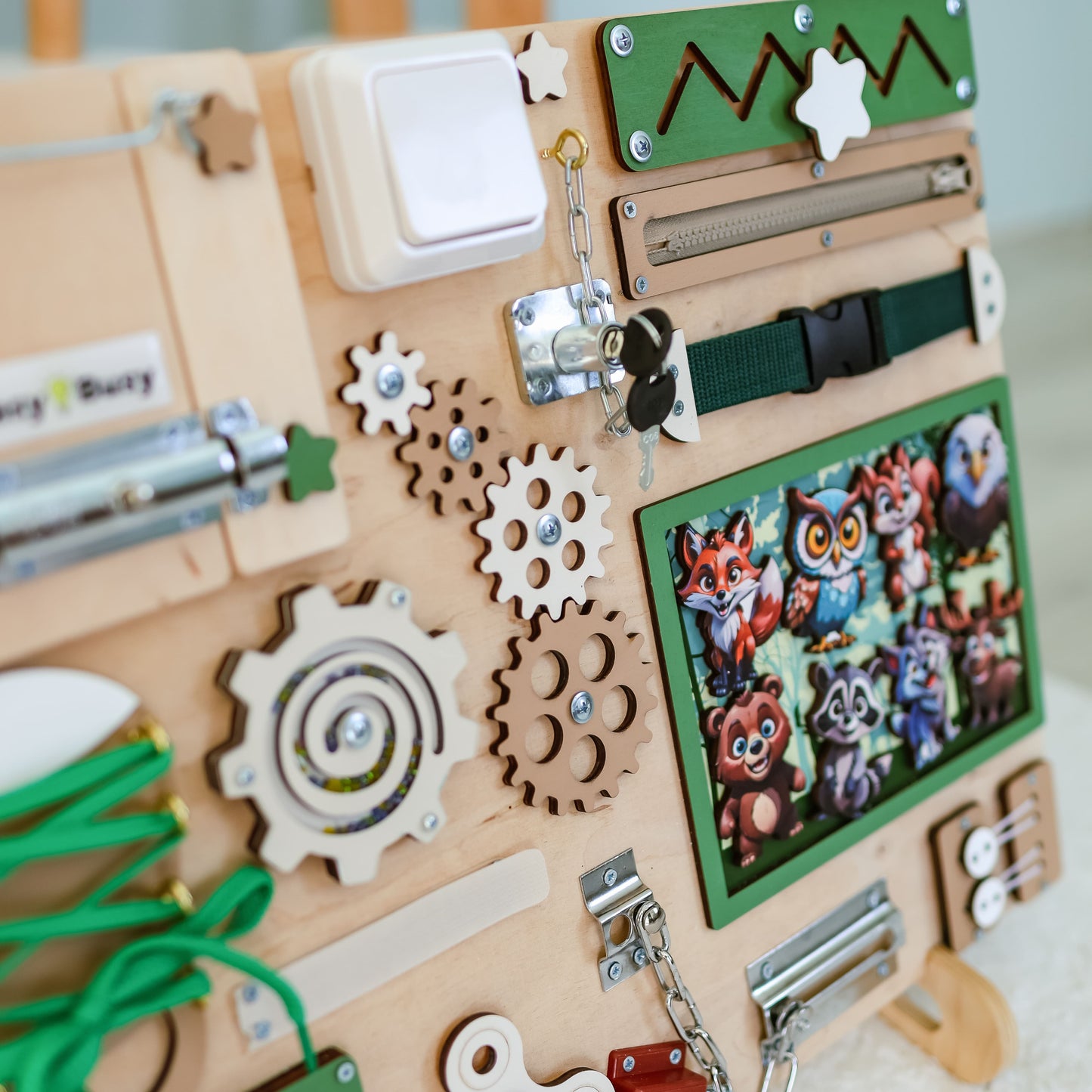 Toddler engaging with an educational magnetic forest board