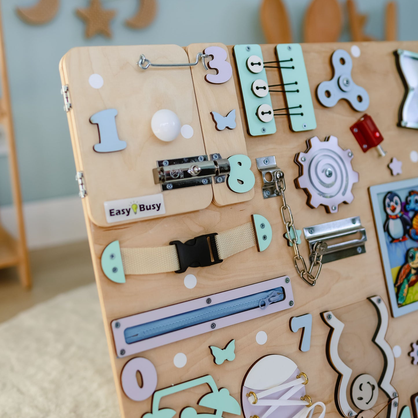 Handmade ocean-themed Montessori activity board with removable magnetic sea animals