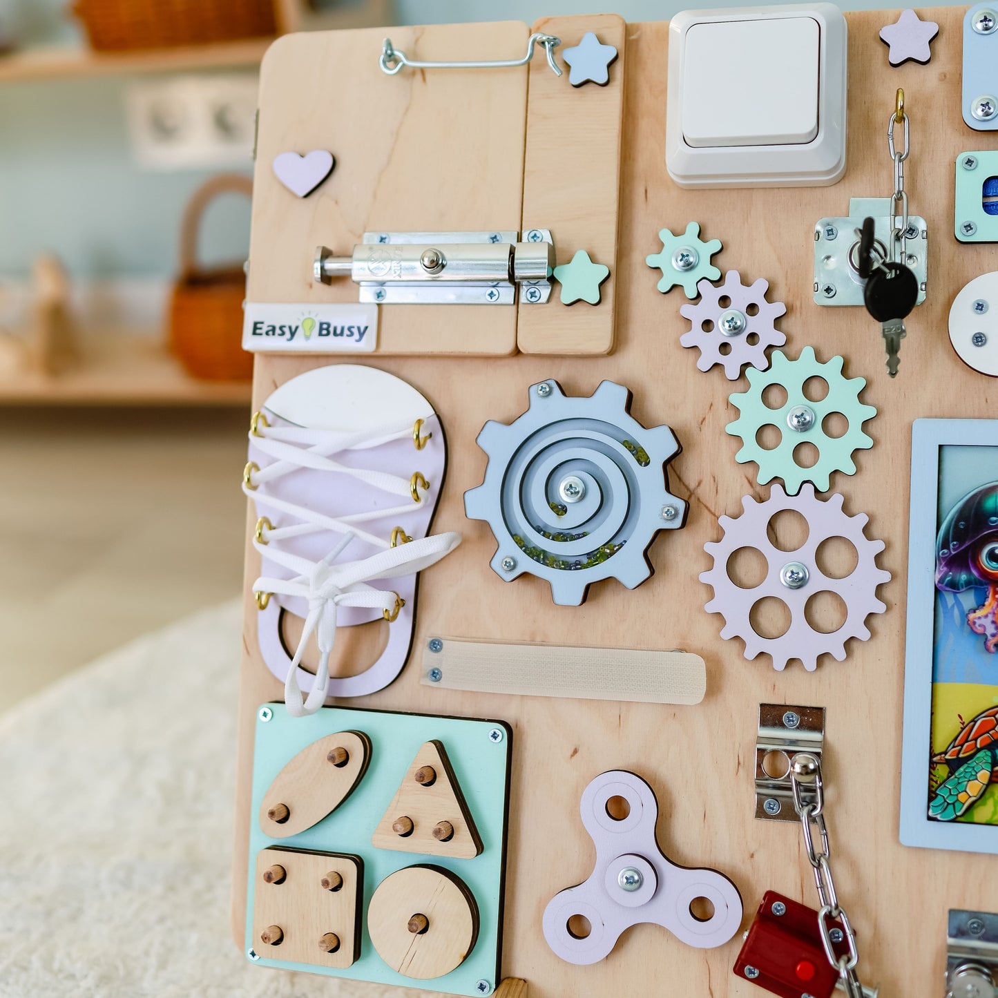 Toddler arranging magnetic sea animals on an interactive activity board