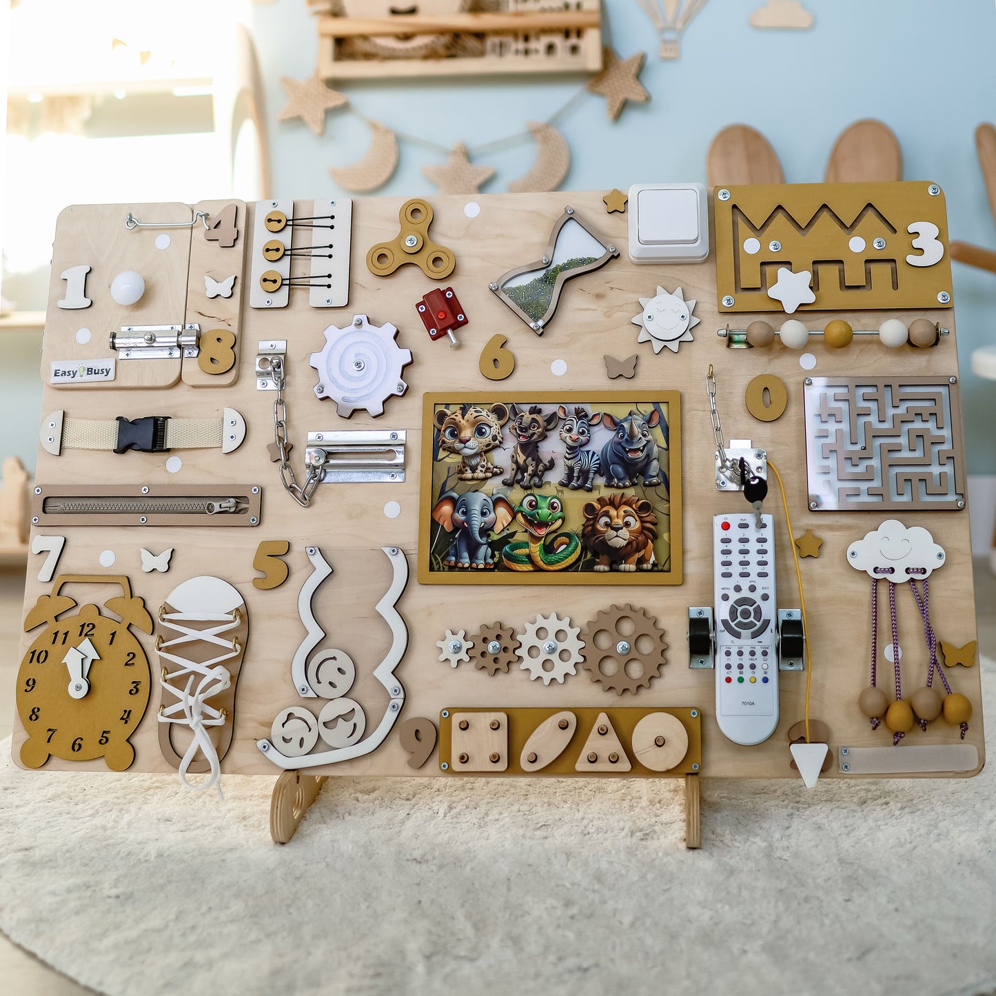 Fine motor skill development toy with a colorful savanna landscape
