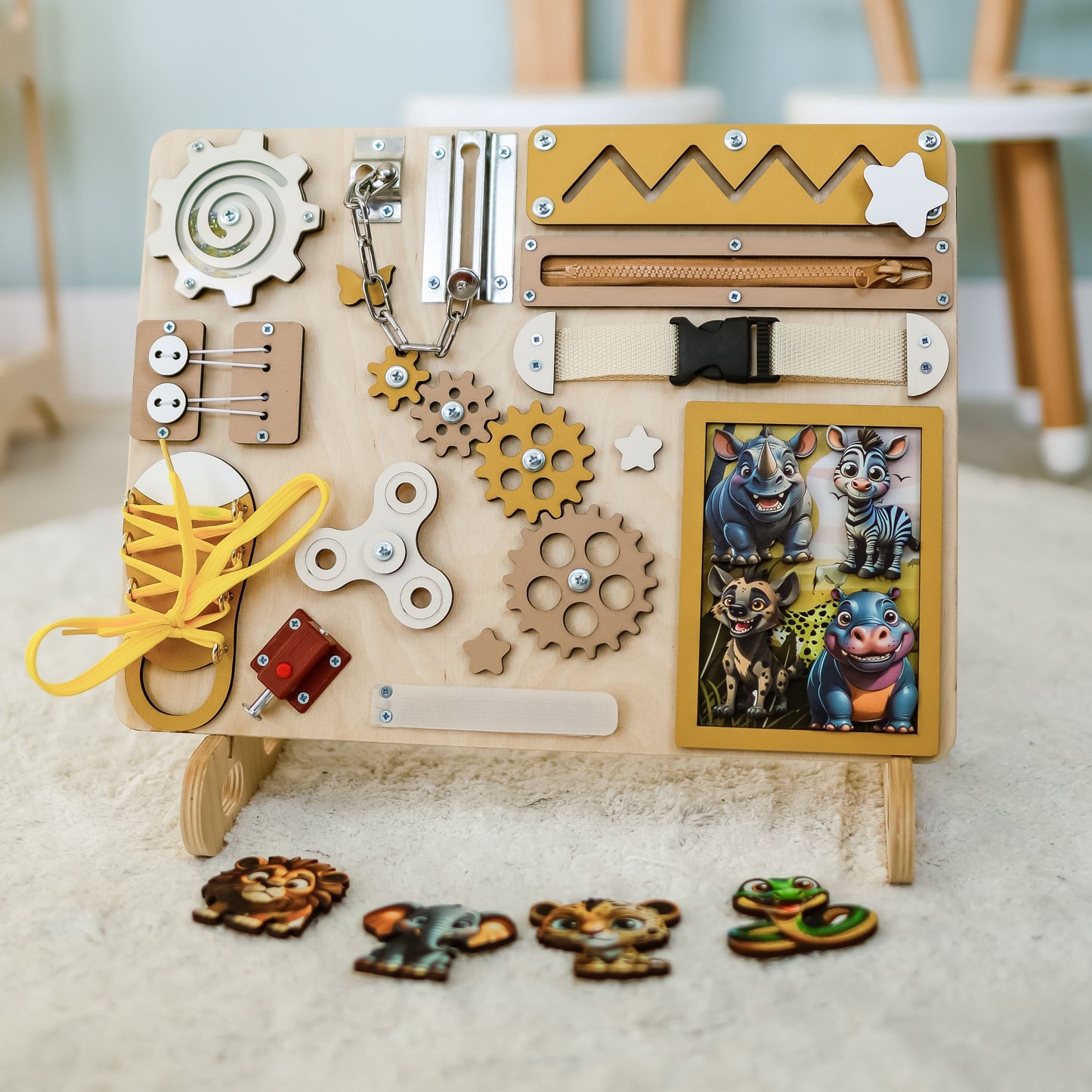 Interactive jungle animals on a handcrafted safari-themed busy board