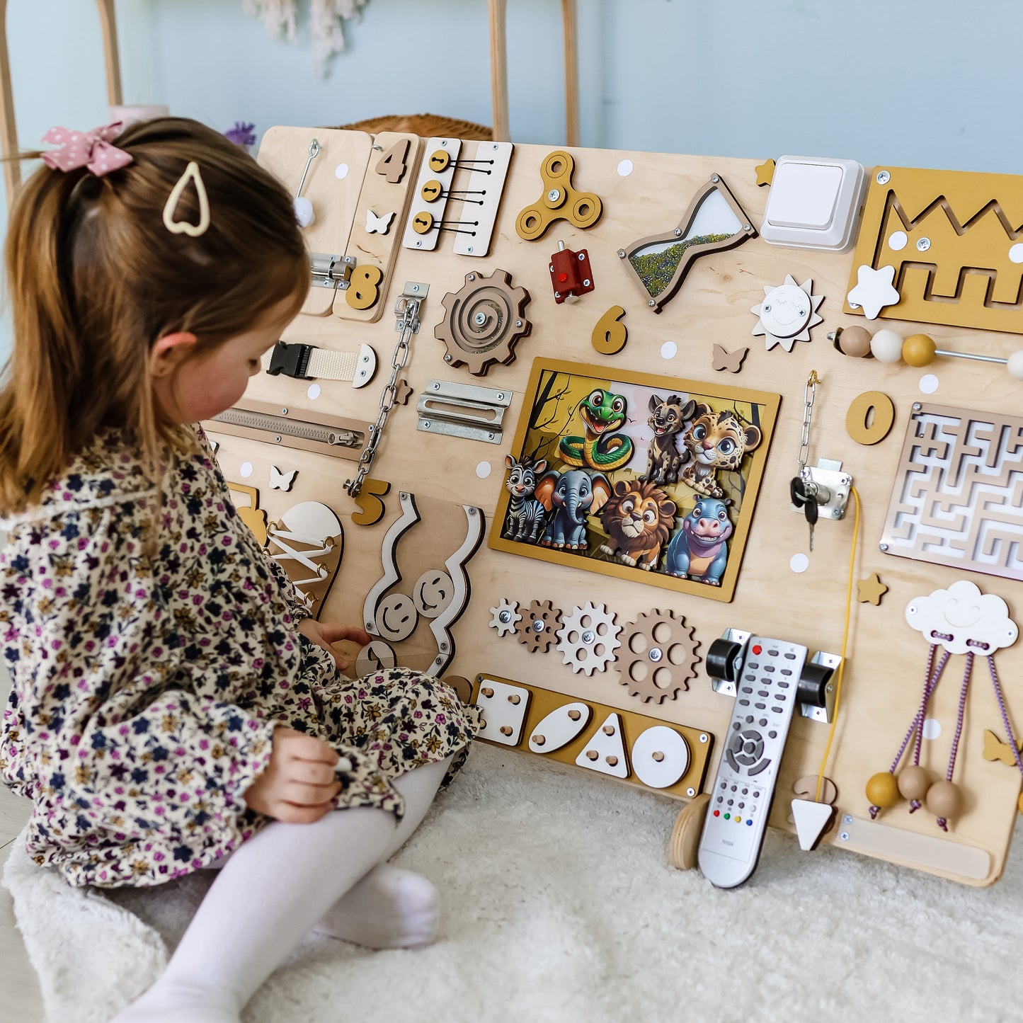 Handmade Montessori activity board with removable magnetic safari animals