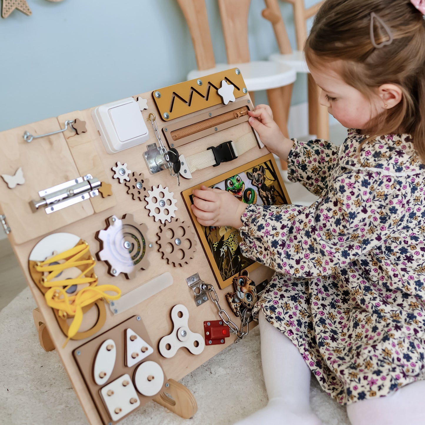 Safari-themed learning toy for toddlers with fine motor skill activities