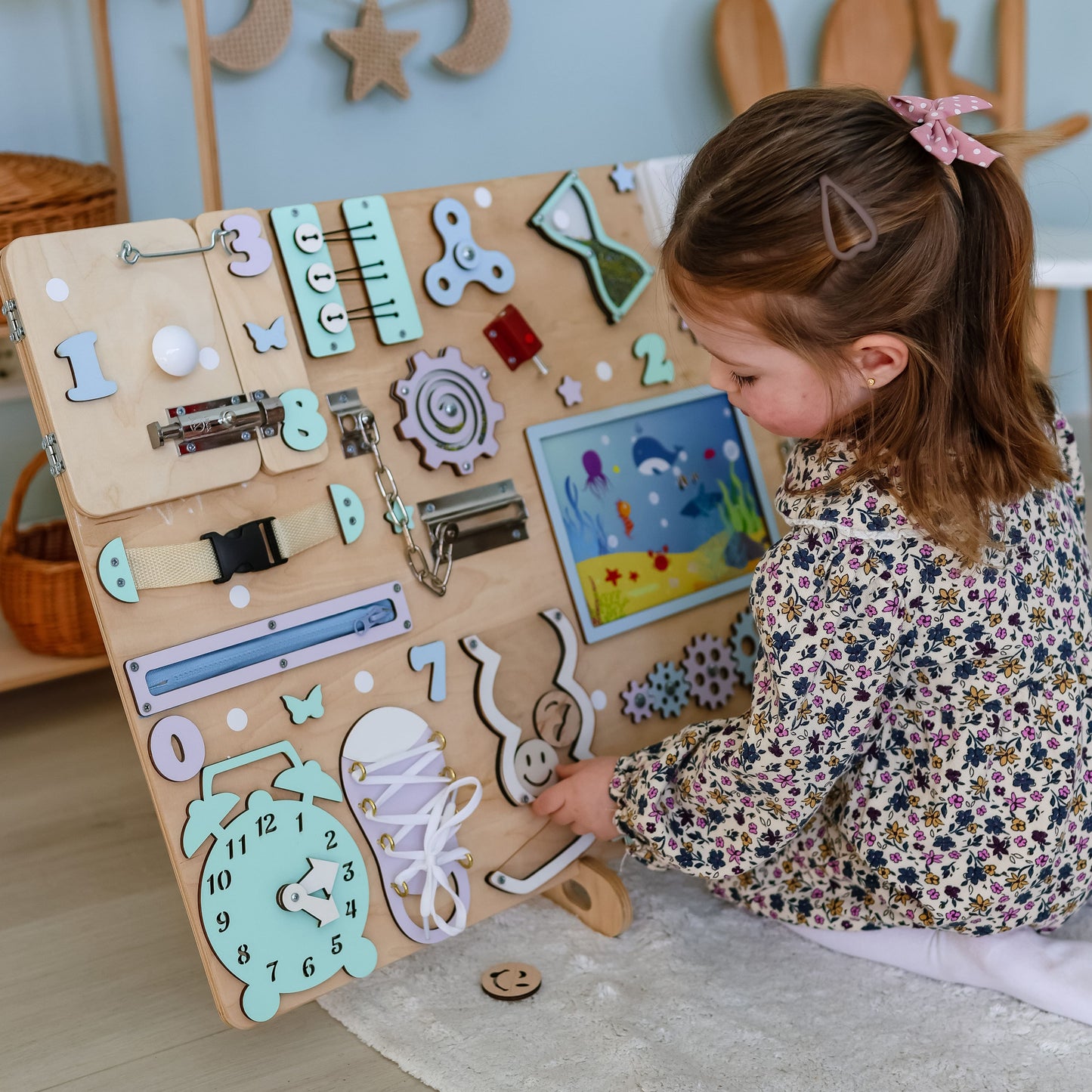 Engaging sea animal-themed busy board designed for group play and exploration