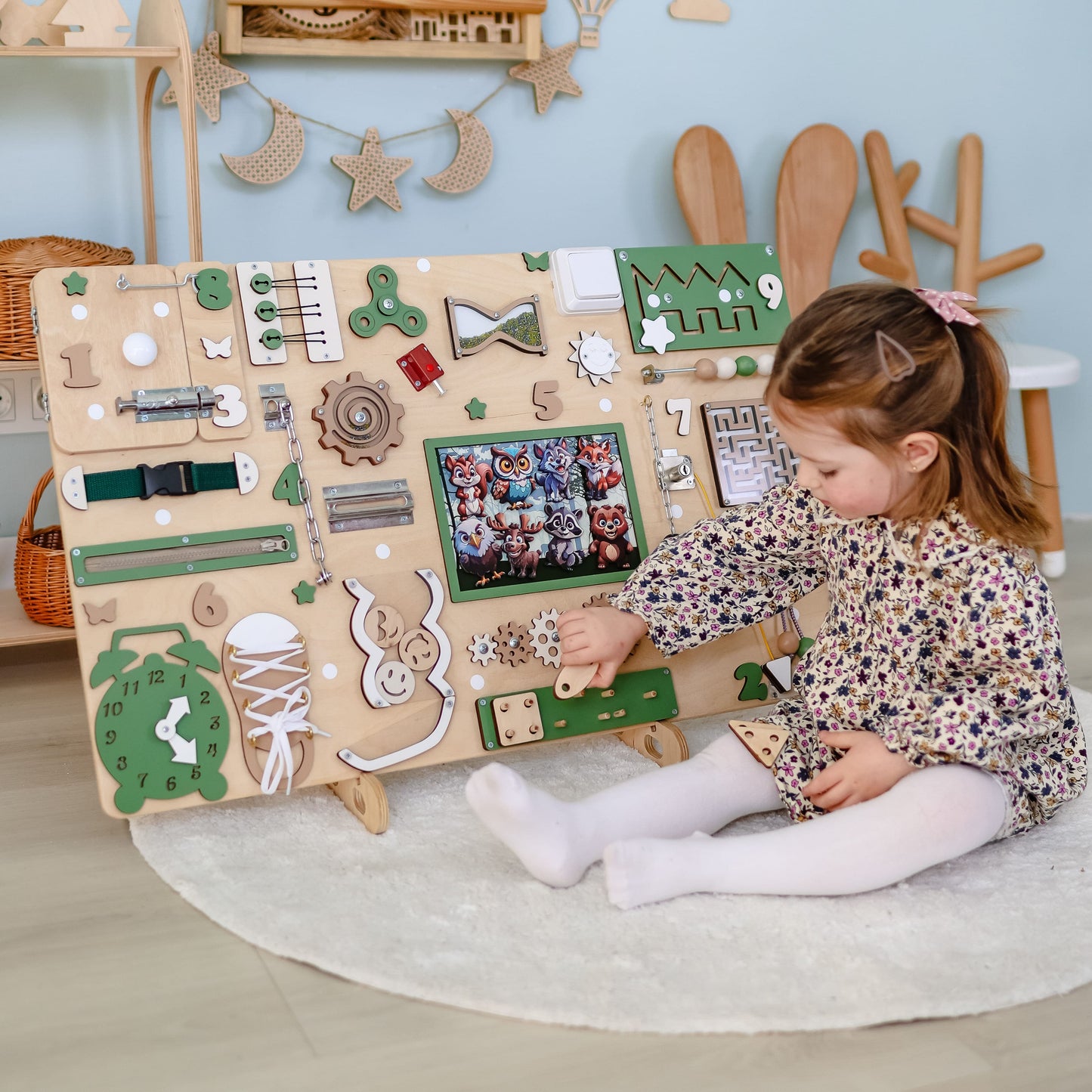 Handcrafted busy board for interactive play and fine motor development