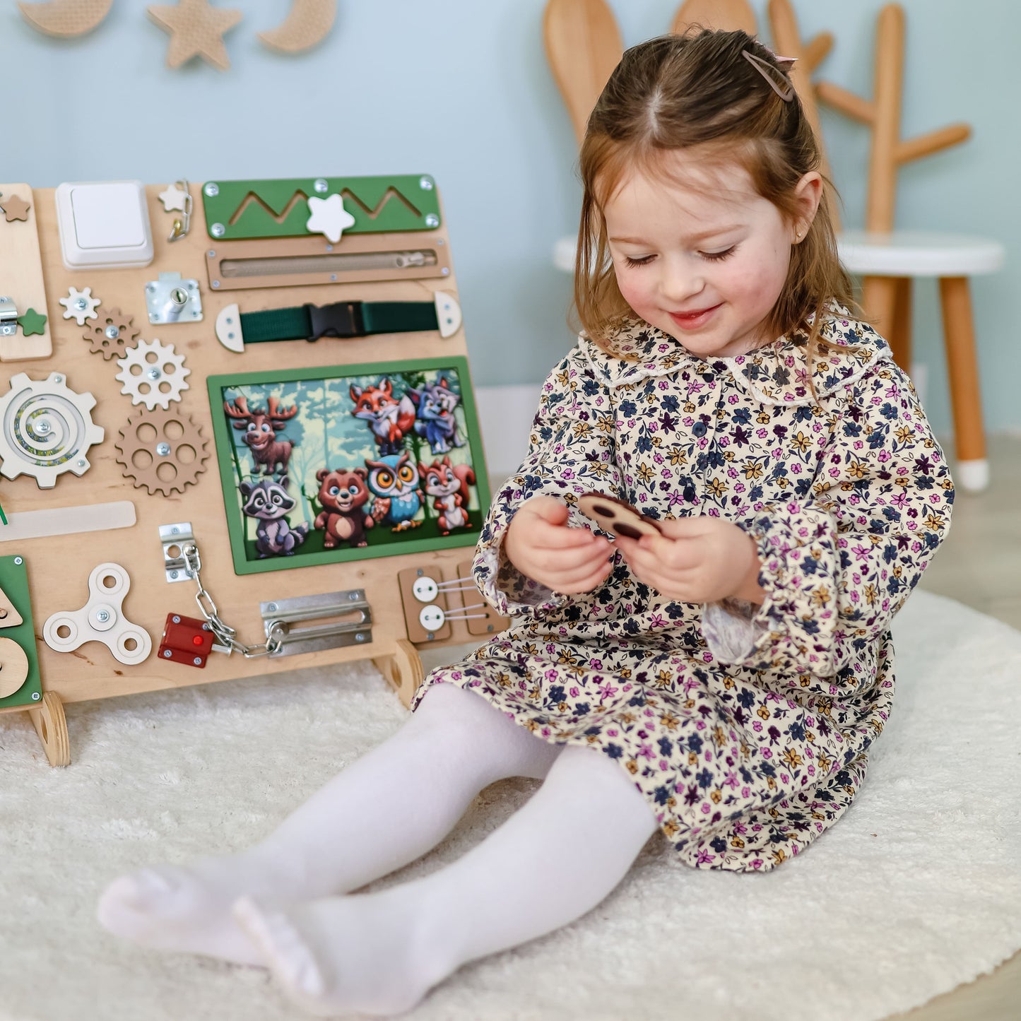 Fox, squirrel, and rabbit magnets on an interactive play board