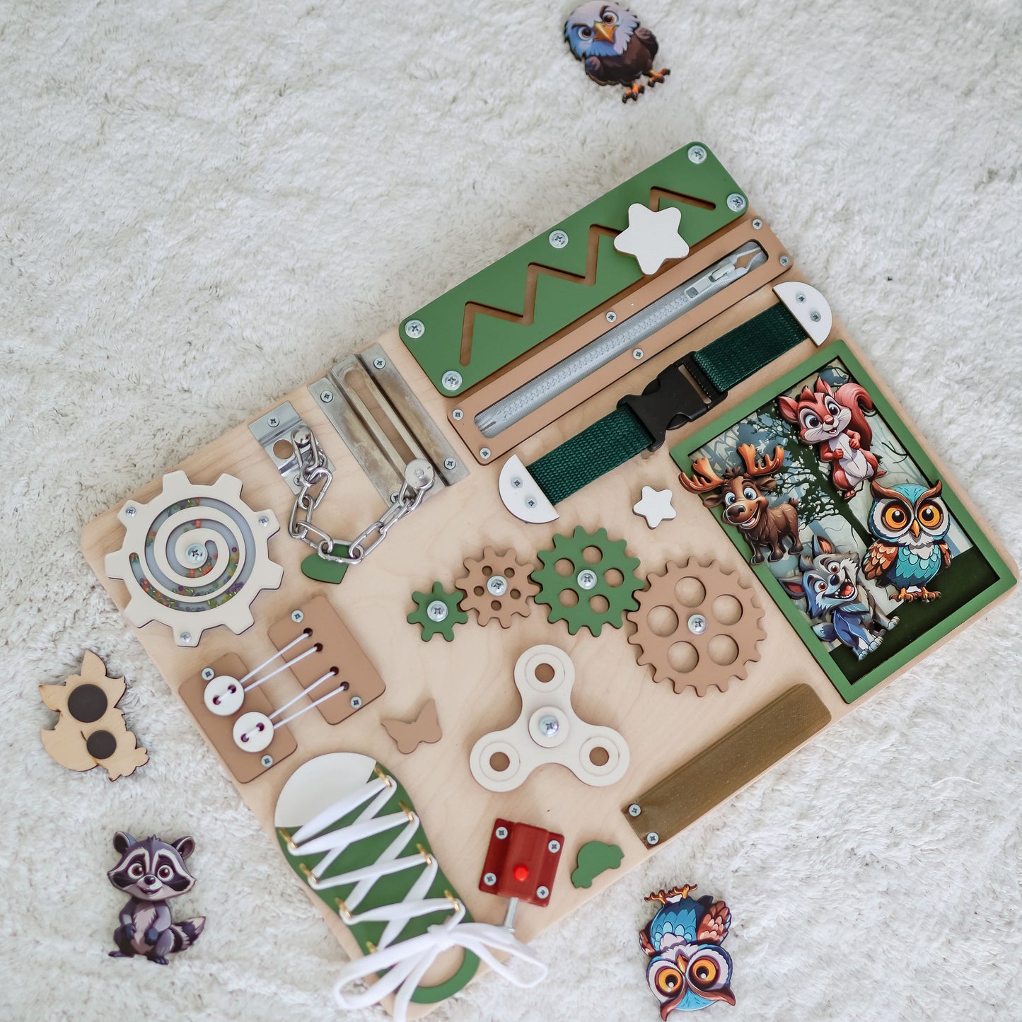 Handcrafted busy board with a vibrant woodland animal theme