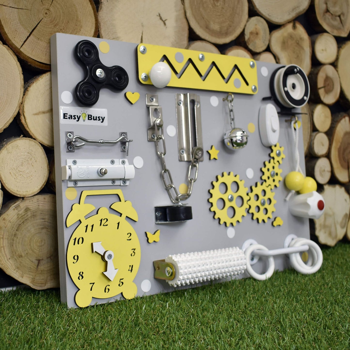 Small wooden busy board with gears and learning tools