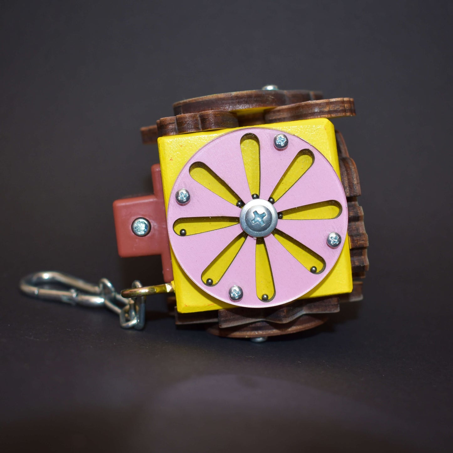 Handheld busy cube with clasp for travel