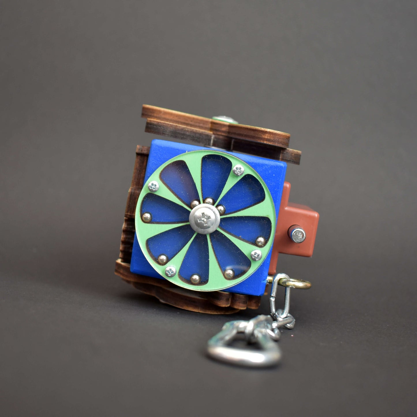 Fine motor toy with maze and slider