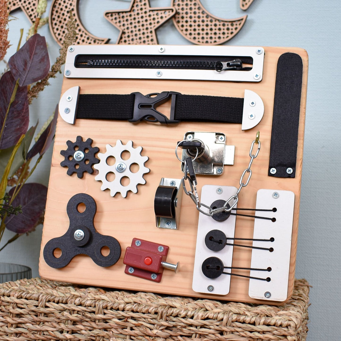 Elderly woman interacting with compact sensory board