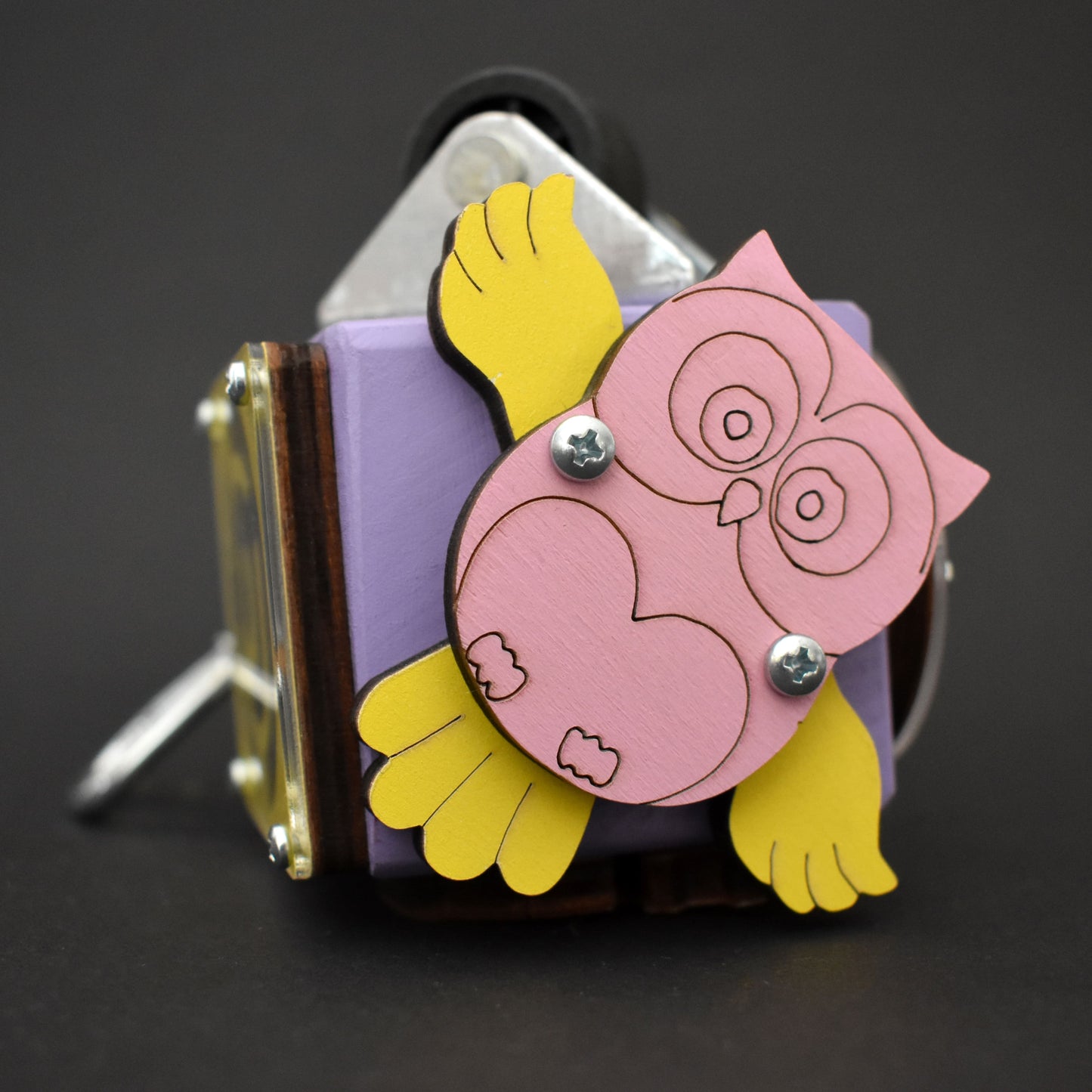 Gear-driven fidget toy with clip-on hook