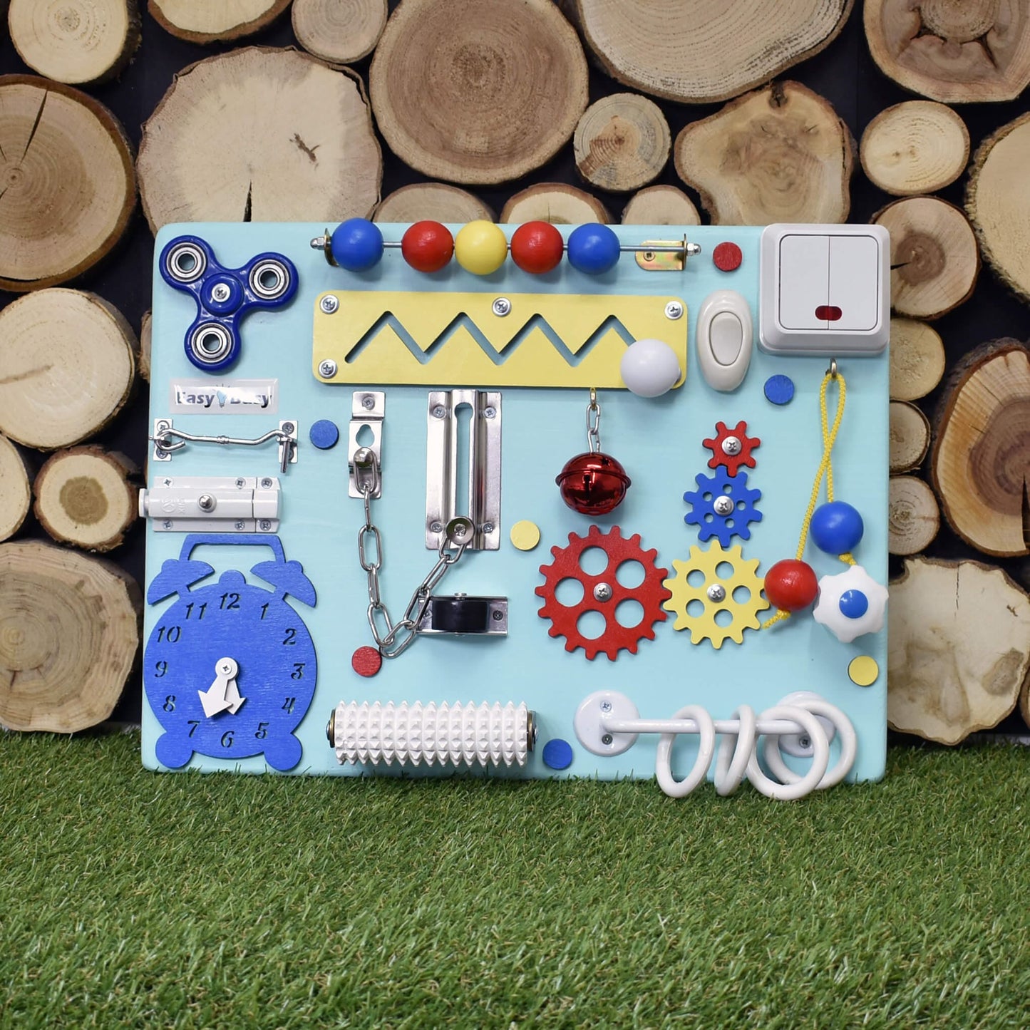 Bright yellow and gray Montessori board with spinner and bells
