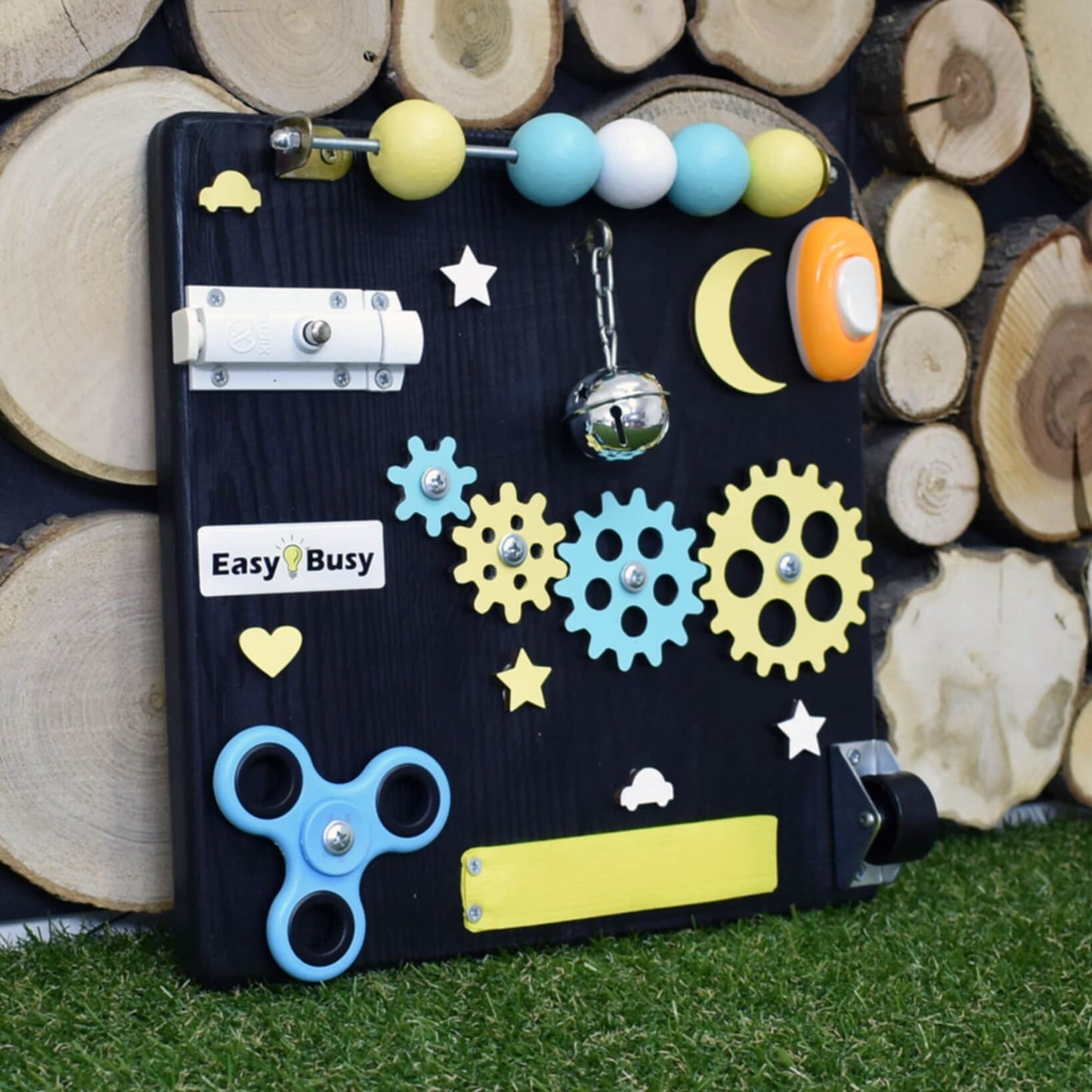 Handmade wooden busy board with interactive features