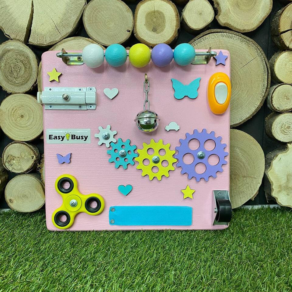 Portable busy board with sensory elements and beads