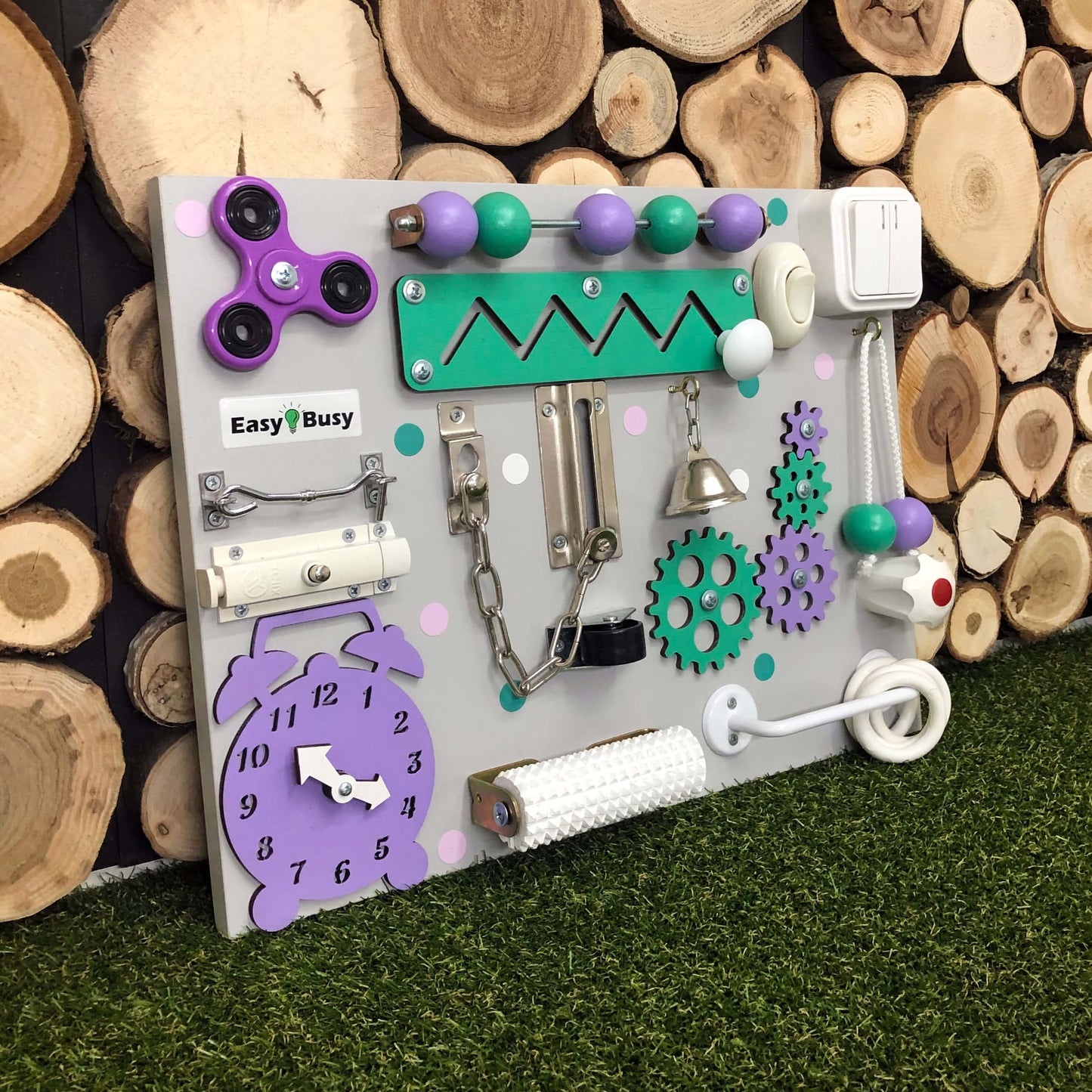 Colorful sensory activity board with beads, spinner, and bell for early learning play