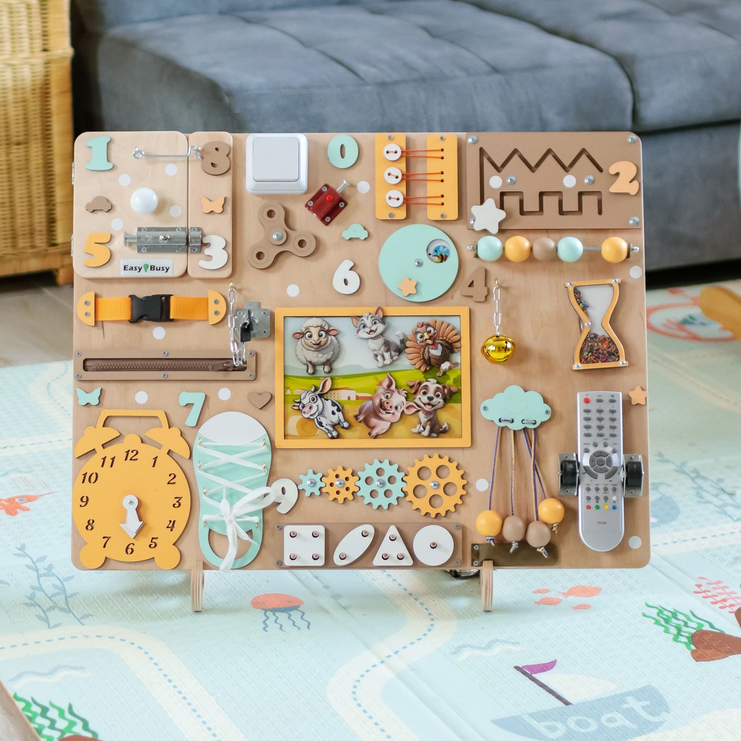 Interactive barnyard animals on a handcrafted busy board