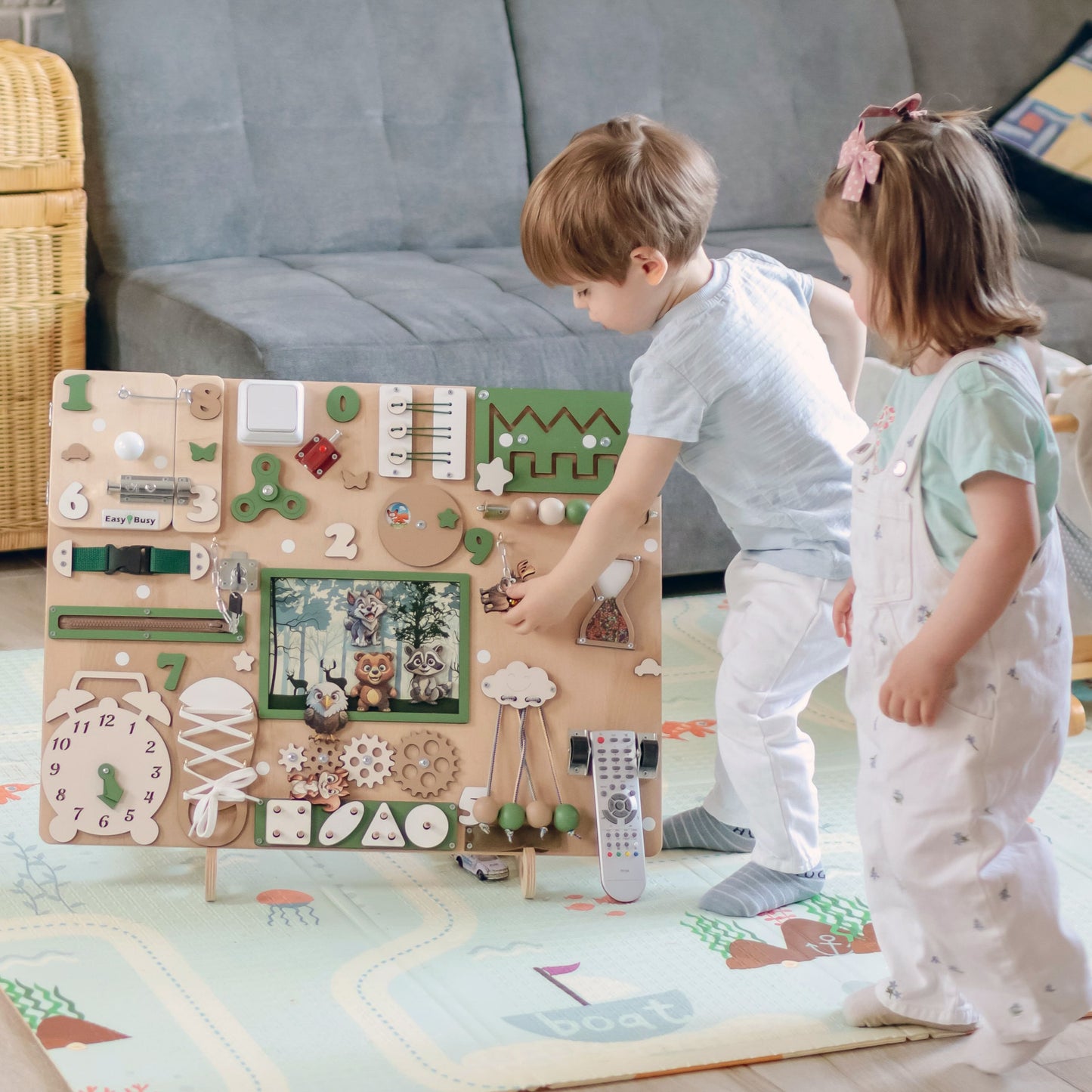 Fine Motor Activities on the Busy Board – A close-up of buttons, locks, and latches that develop hand-eye coordination