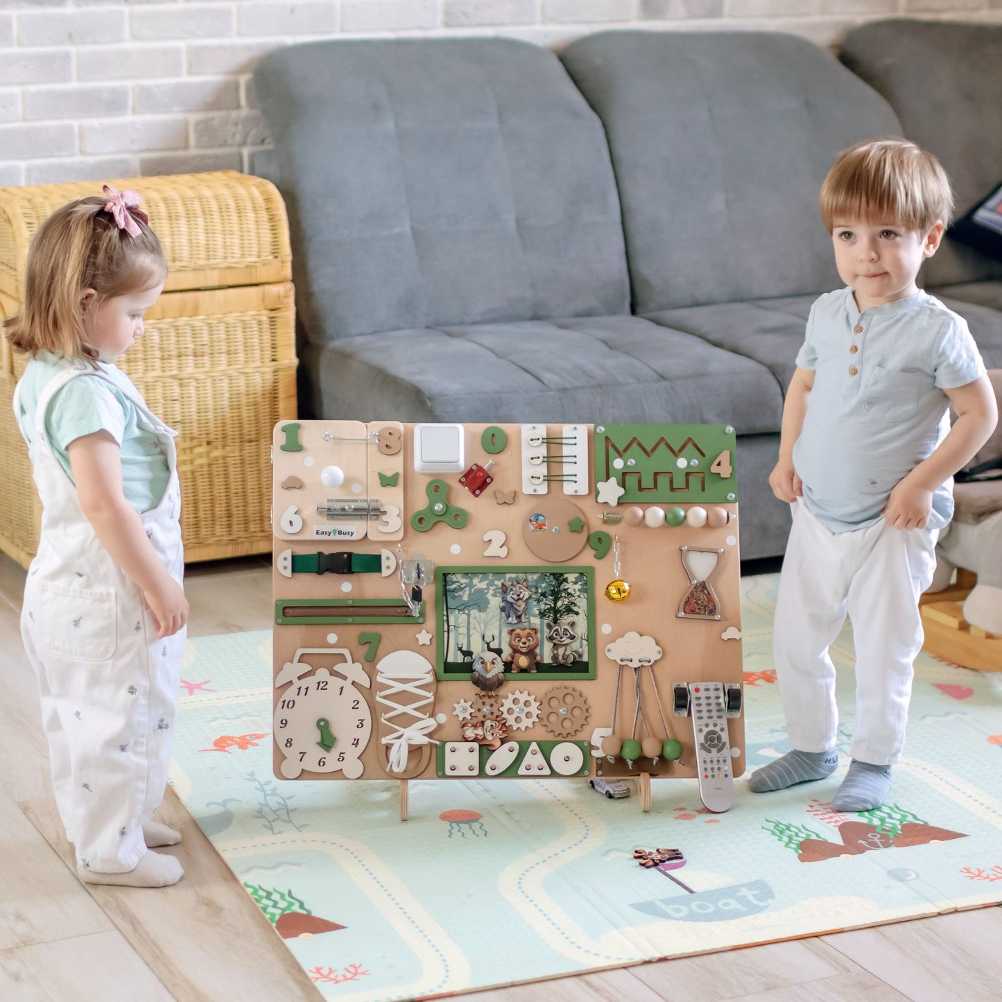 Wall-Mounted Forest Animal Busy Board – The busy board installed in a nursery or playroom as a decorative learning tool