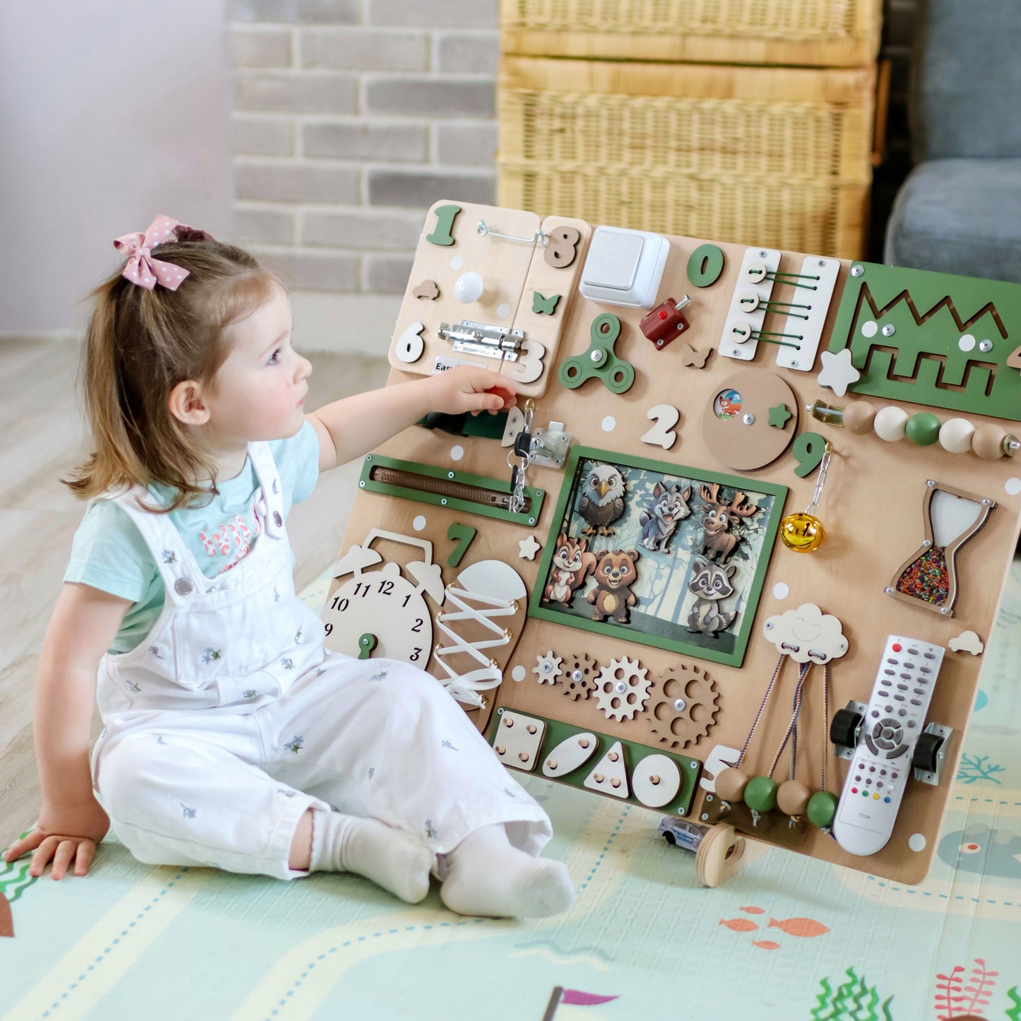 Busy Board in Gift Packaging – The beautifully wrapped wooden activity board, ready to be gifted