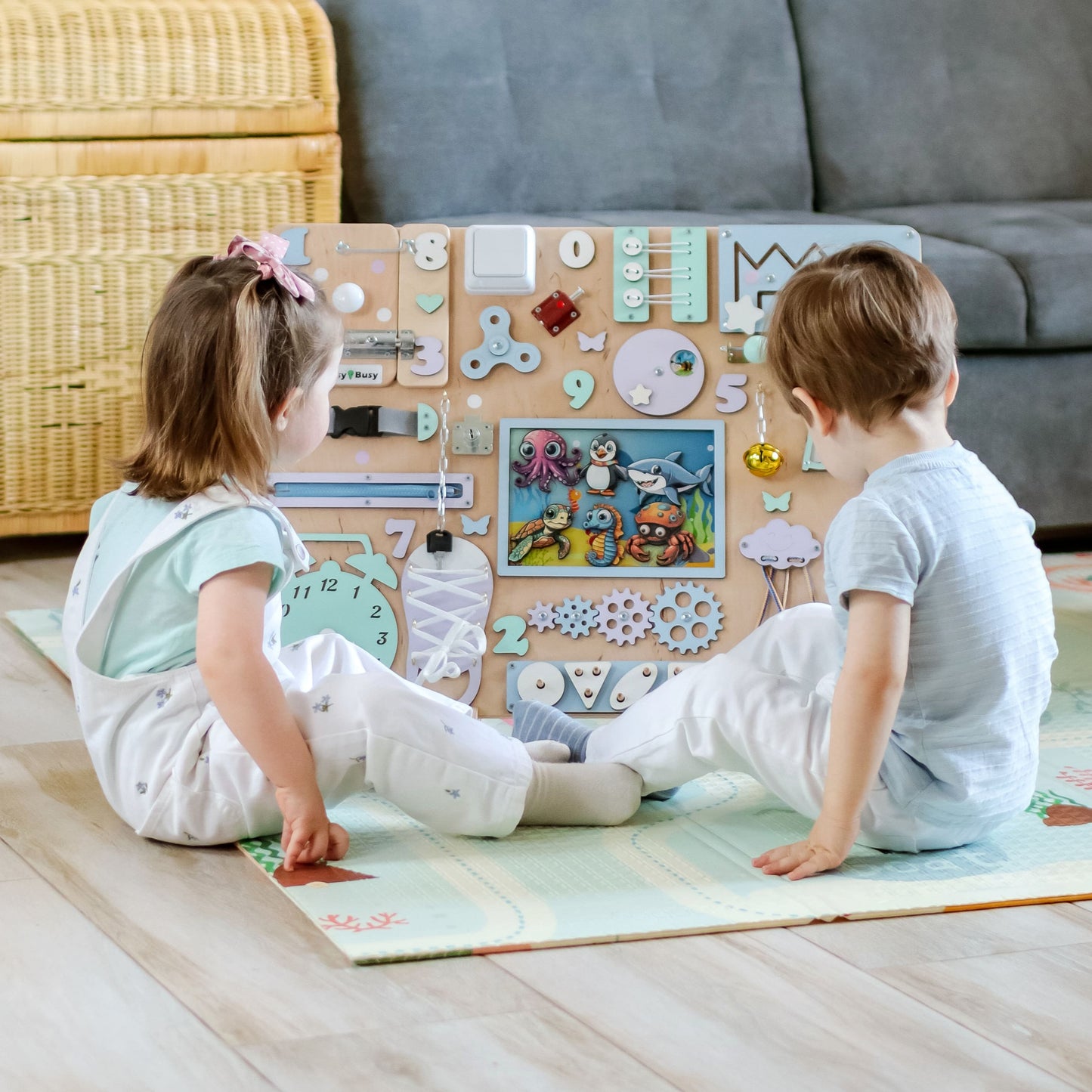 Handmade underwater-themed wooden busy board with removable magnetic sea animals