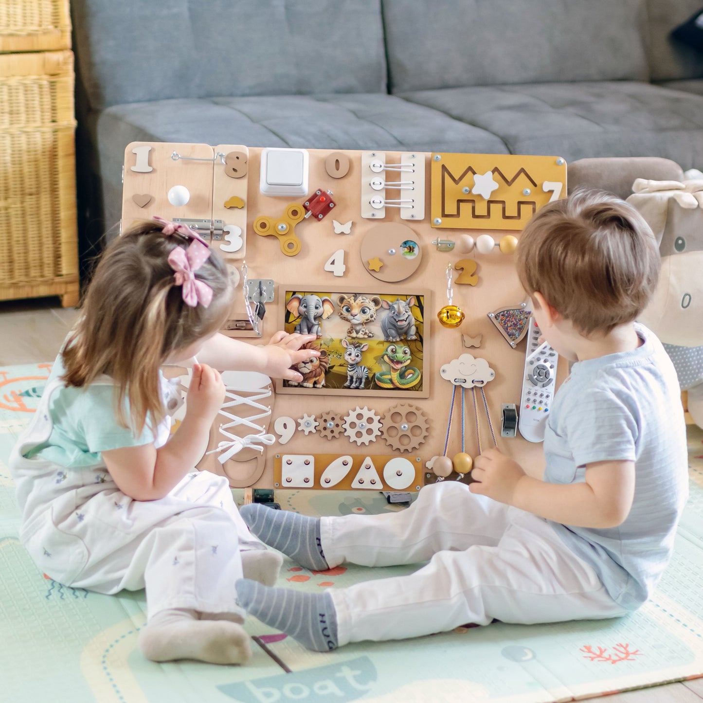 Handmade Montessori activity board with removable magnetic safari animals