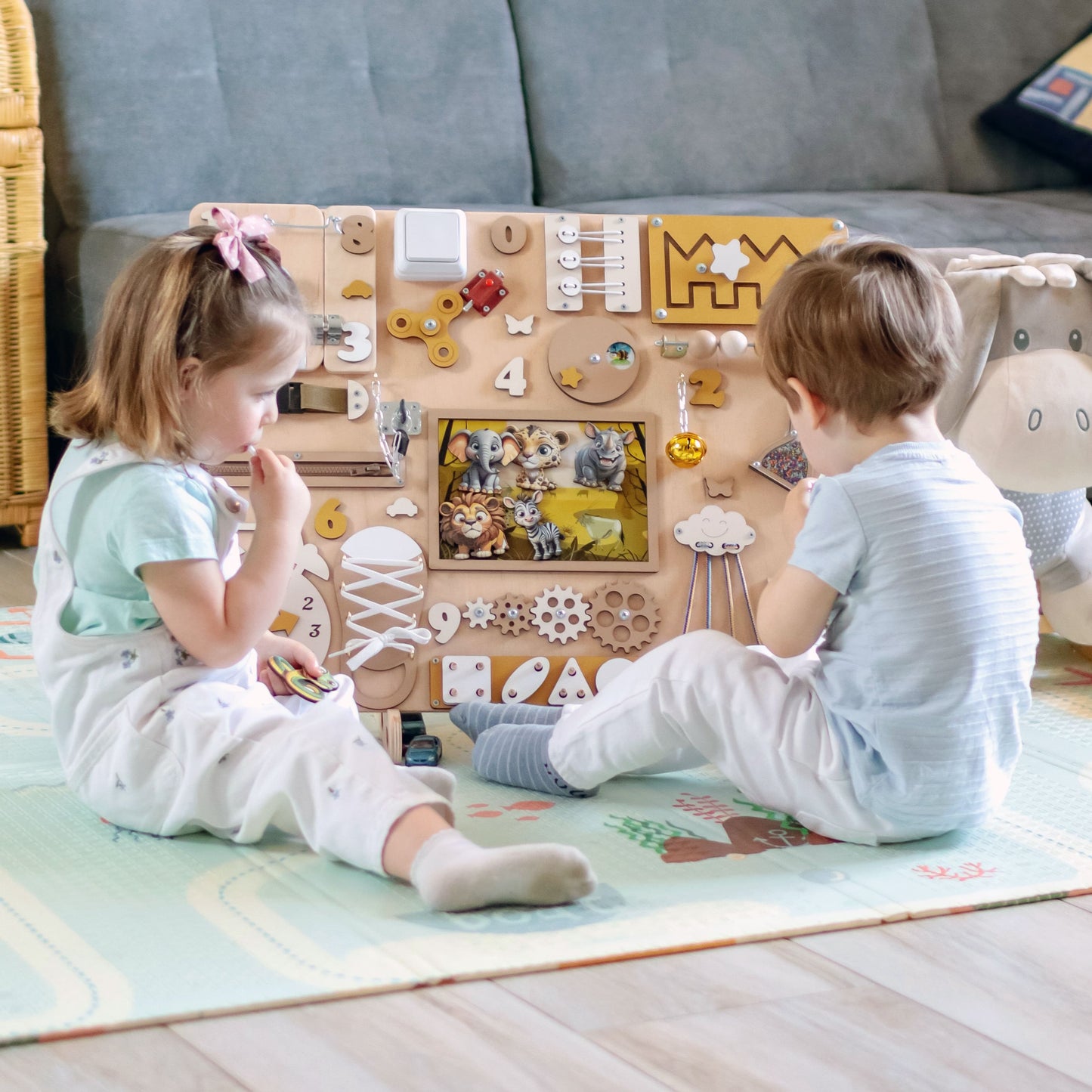 Fine motor skill development toy with a colorful African savanna backdrop