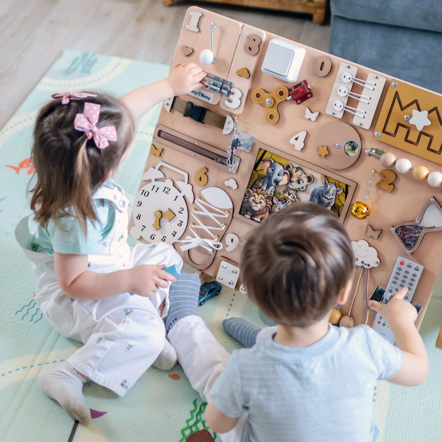 Safe and non-toxic sensory play board with removable magnetic pieces