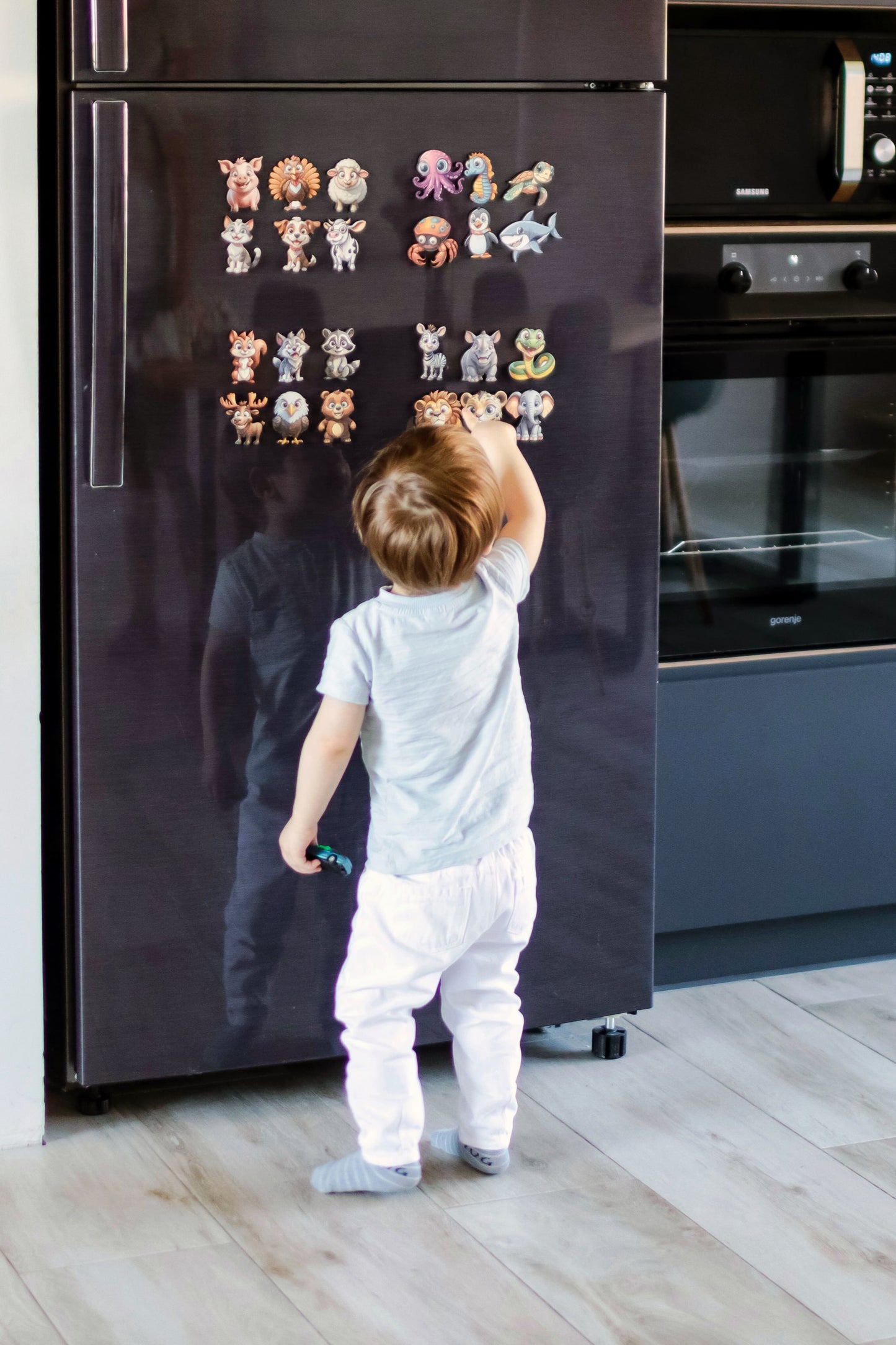 Interactive jungle animals on a vibrant safari-themed busy board