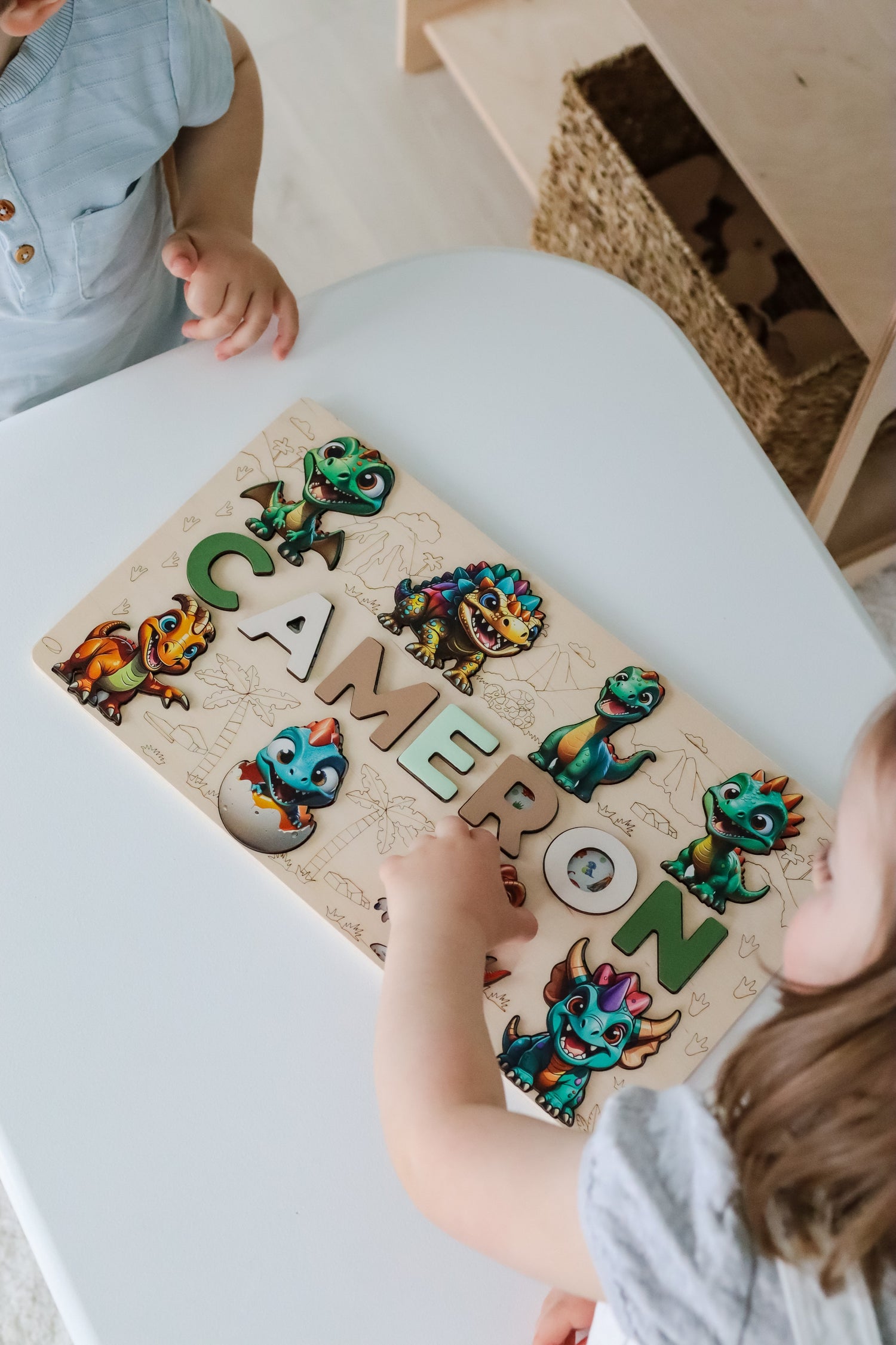 Custom wooden name puzzle for toddlers, designed to help children learn letters and develop fine motor skills while having fun