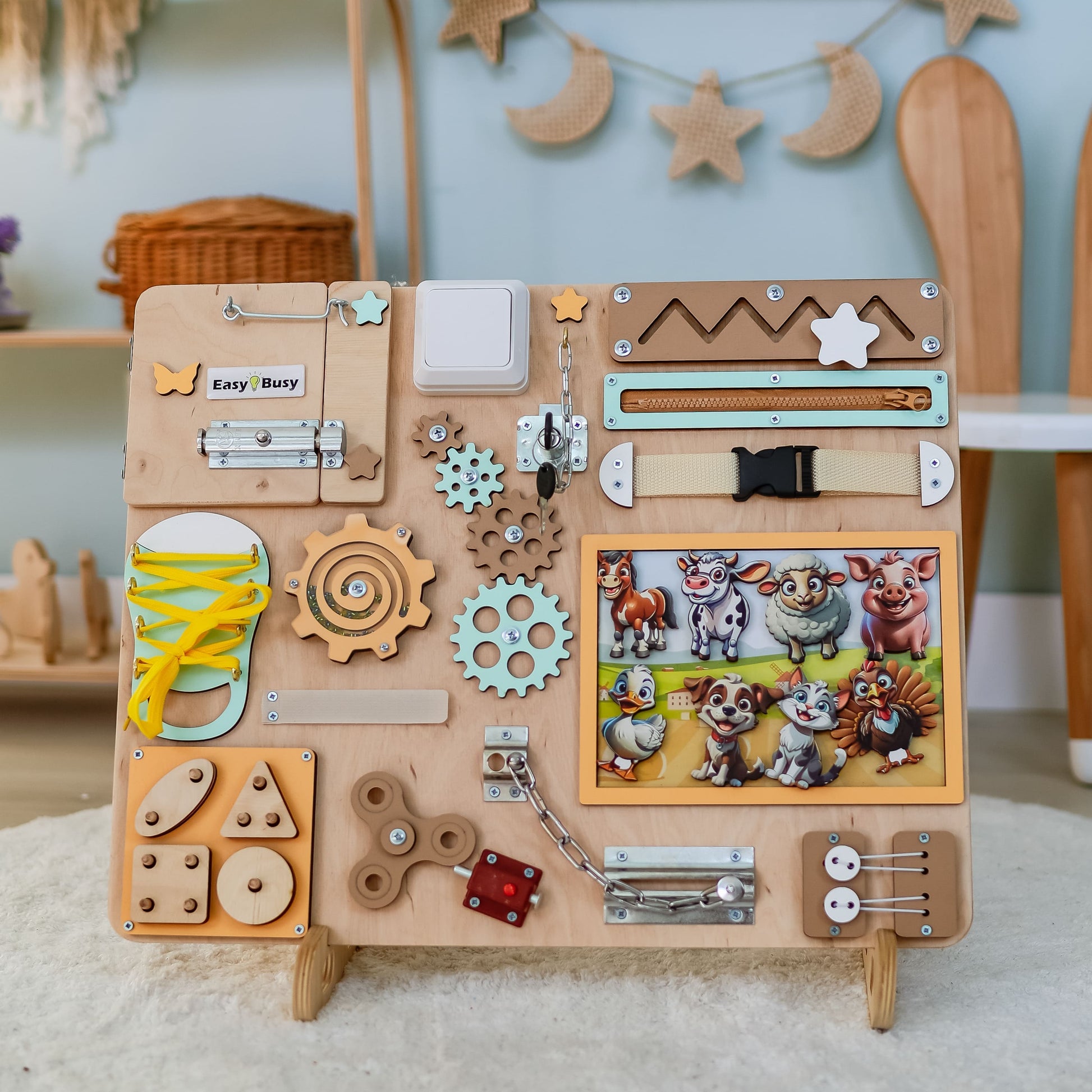 Magnetic pigs, cows, and sheep on a farm-themed sensory board