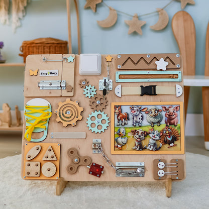 Magnetic pigs, cows, and sheep on a farm-themed sensory board